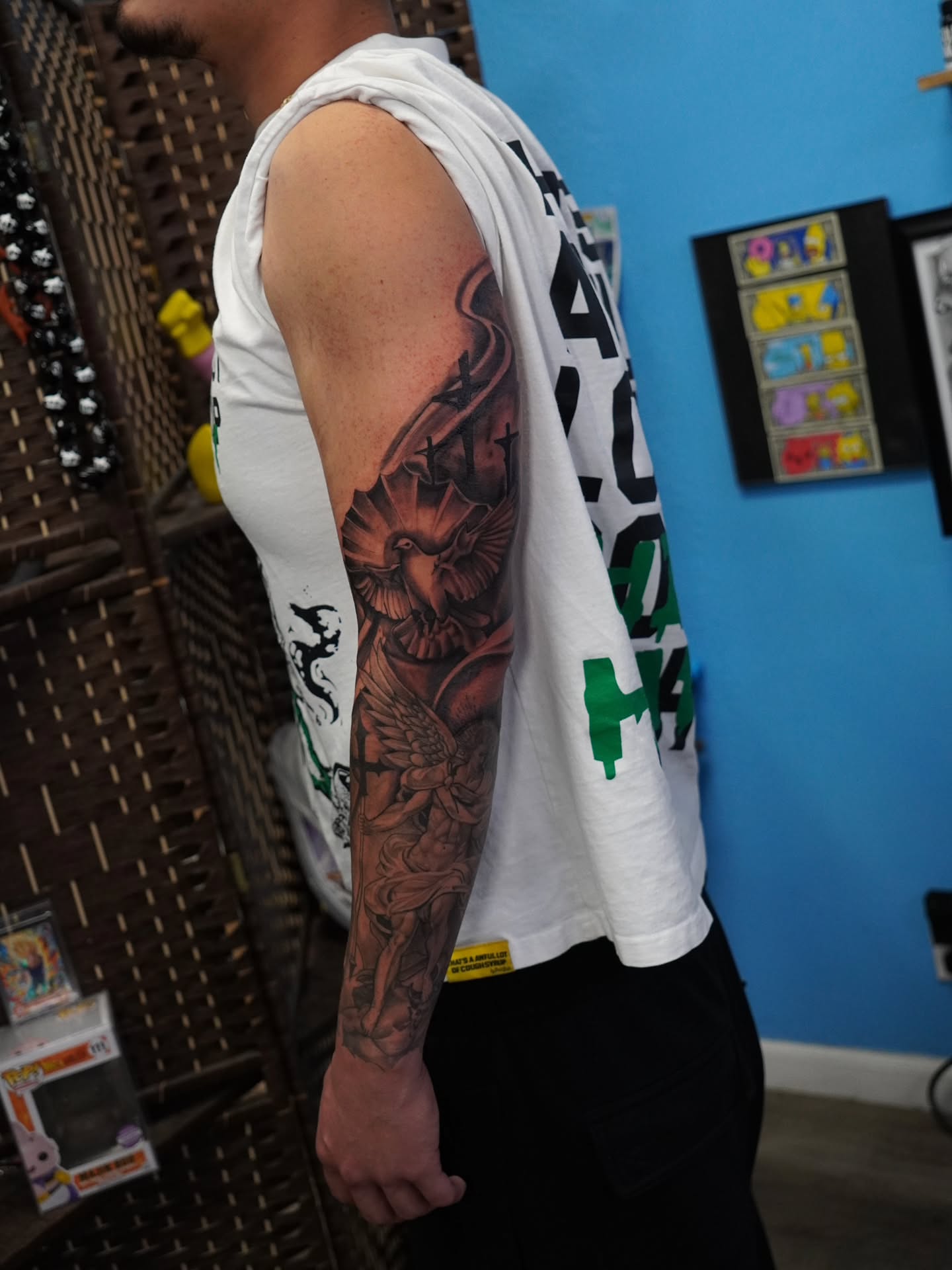 Lion and dragon American traditional tattoo on the upper arm by @tattoobytats