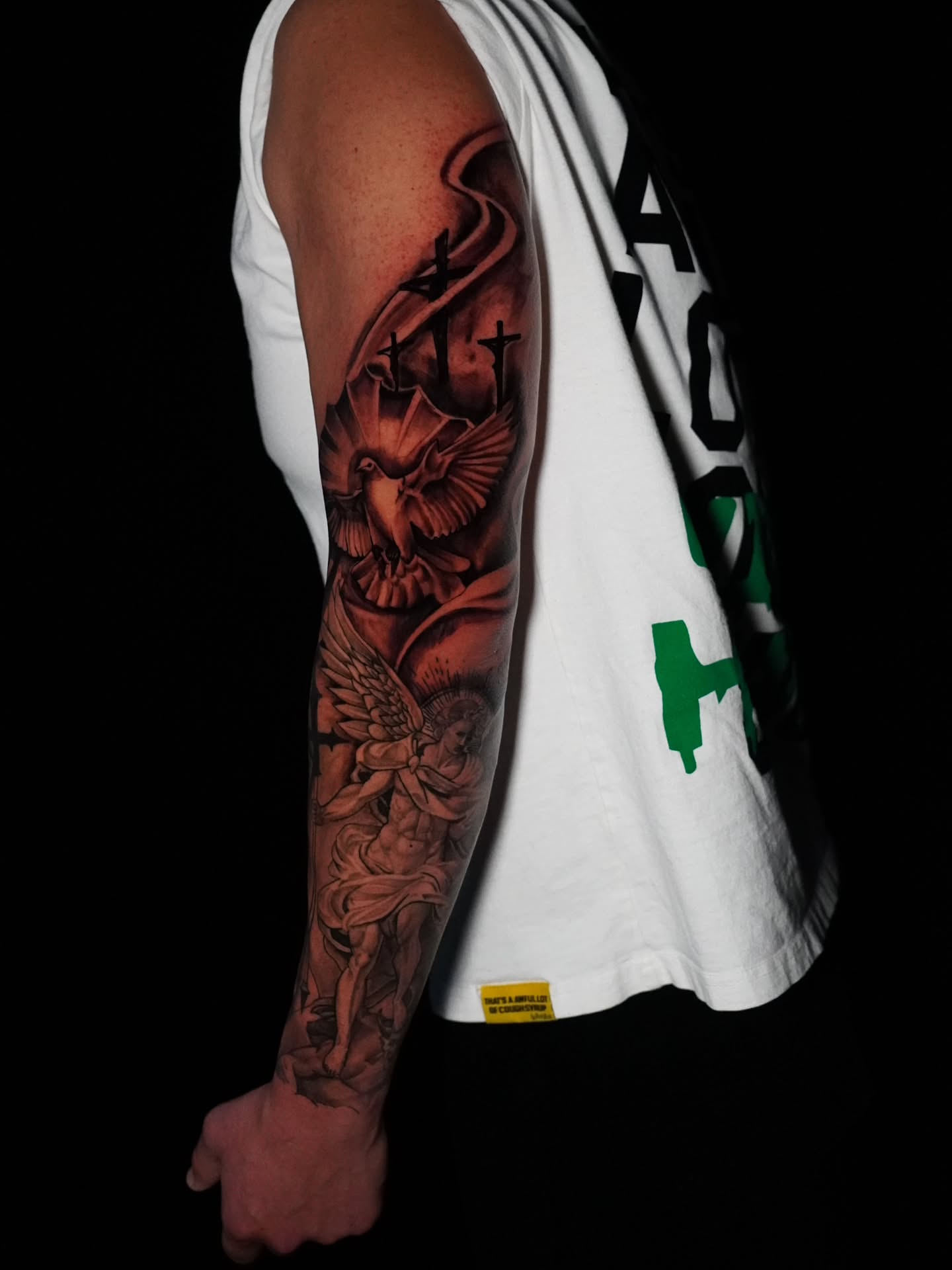 Dove and crosses American traditional tattoo on the forearm by @tattoobytats