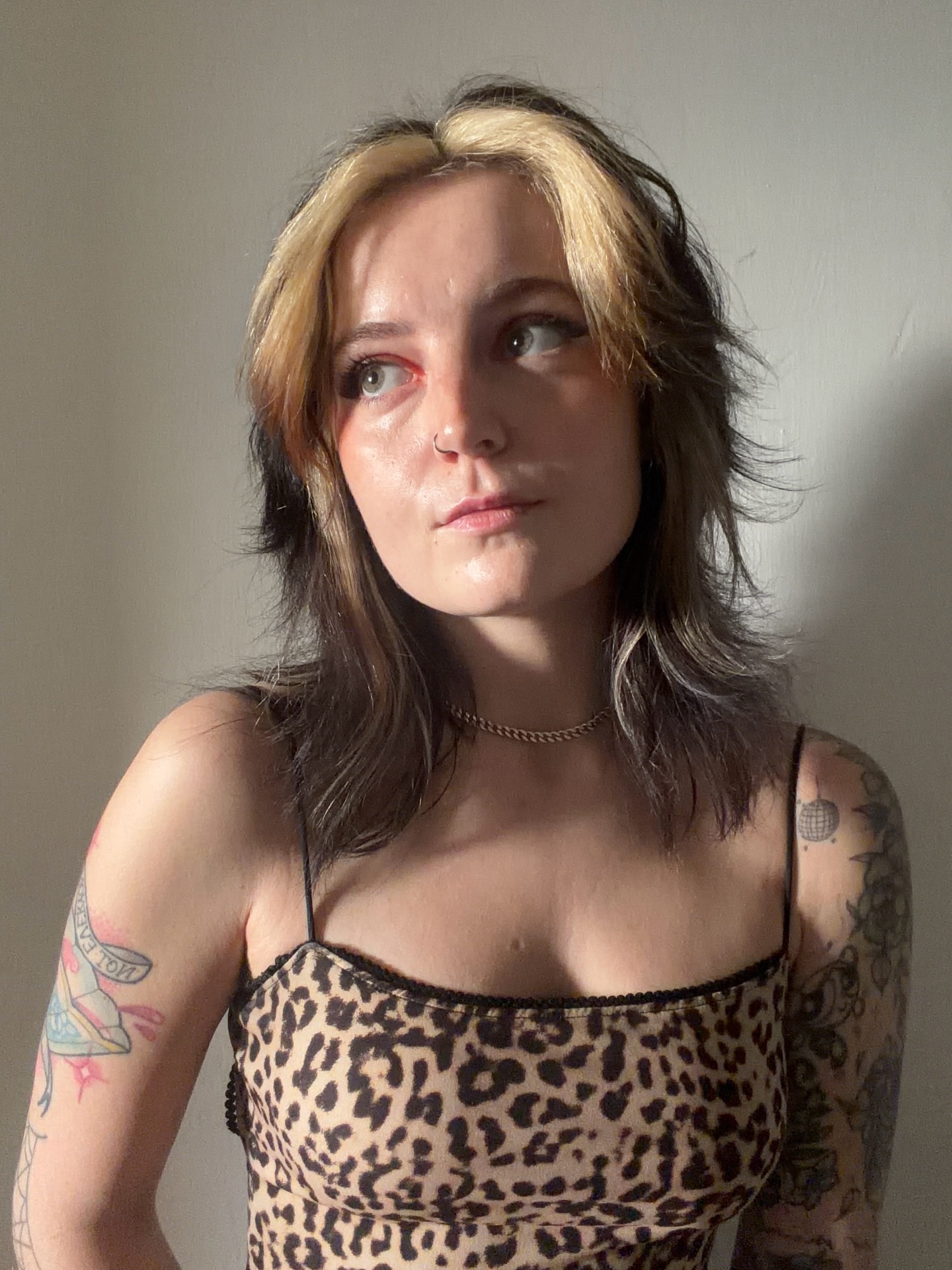 Leopard print new school tattoo on the torso by Poppy Olivia Deards