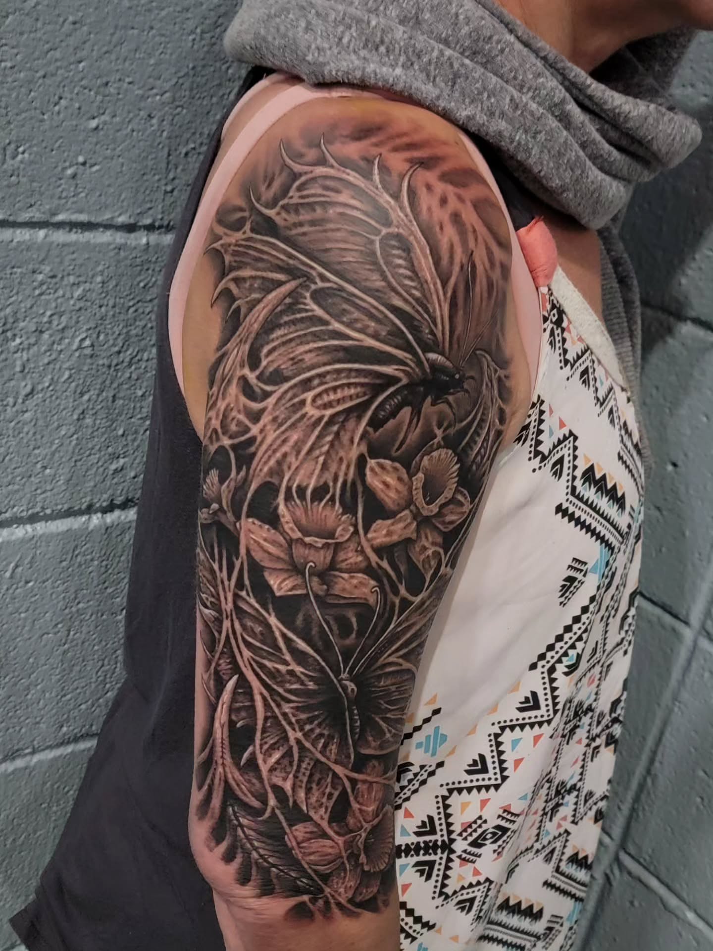 Tattoo by @necronomiconnor — black_and_grey, realism