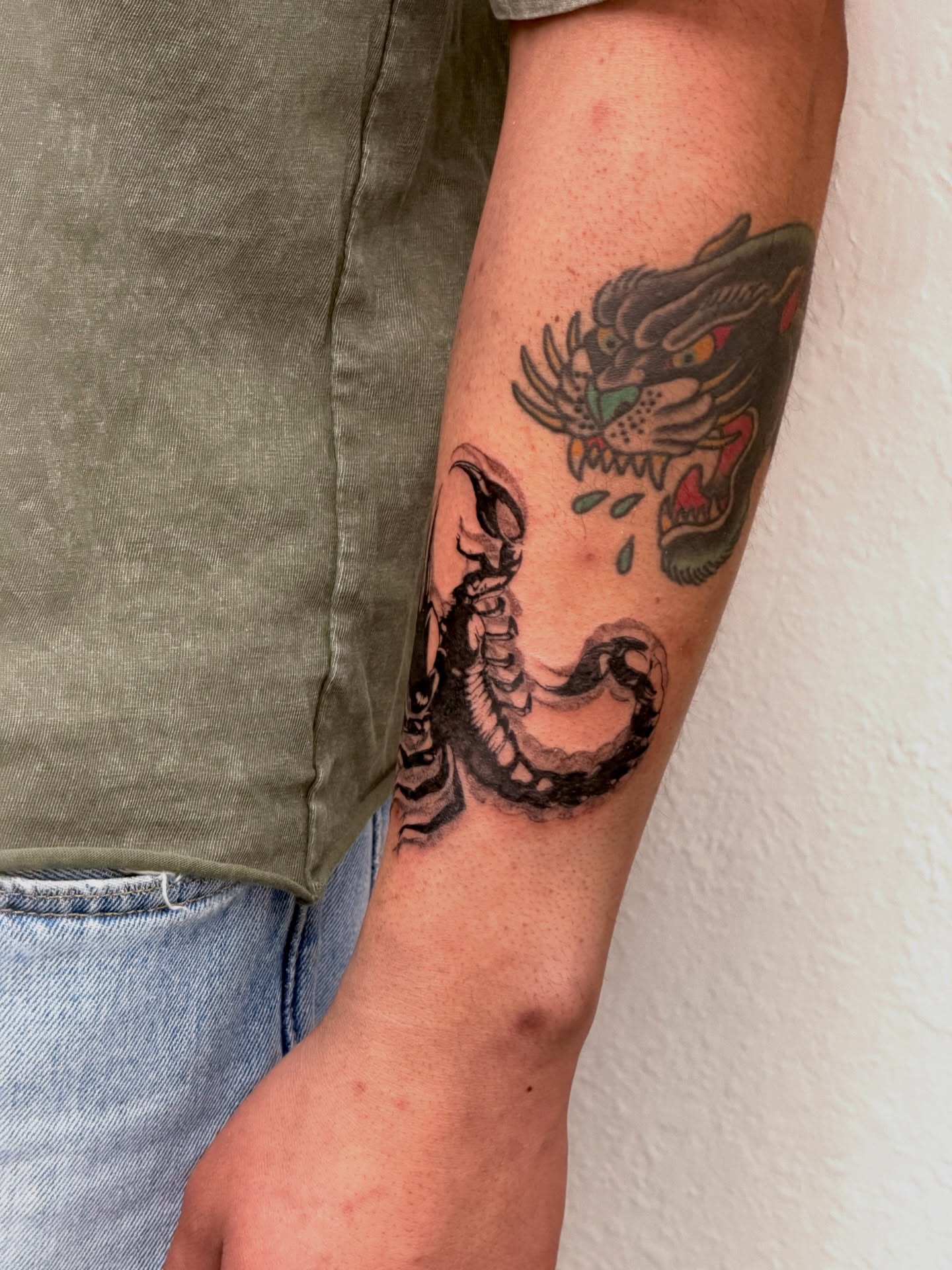 Tiger American traditional tattoo on the forearm by Bryan Nguyen