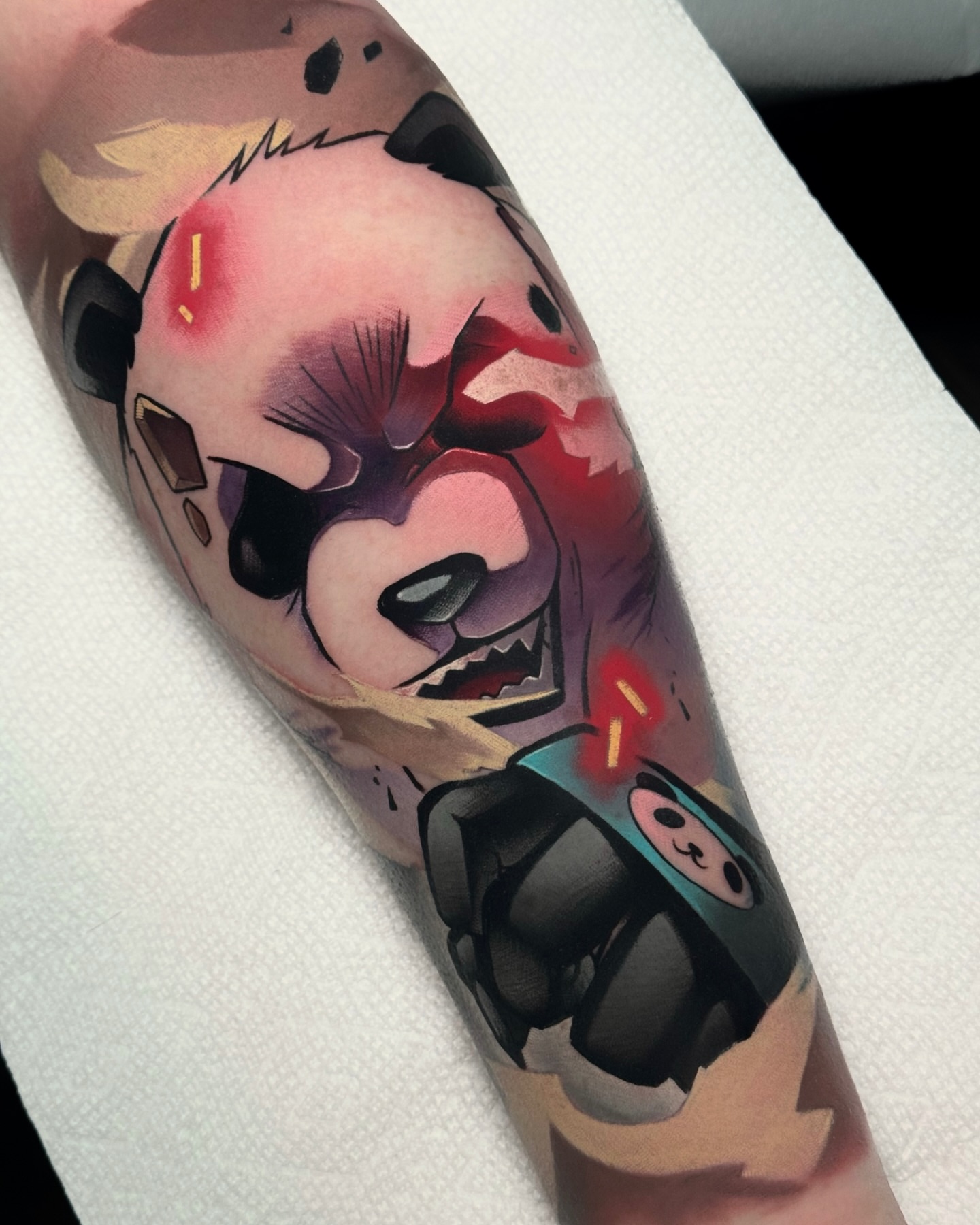 Panda and ninja dotwork tattoo on the forearm by Bee Rye