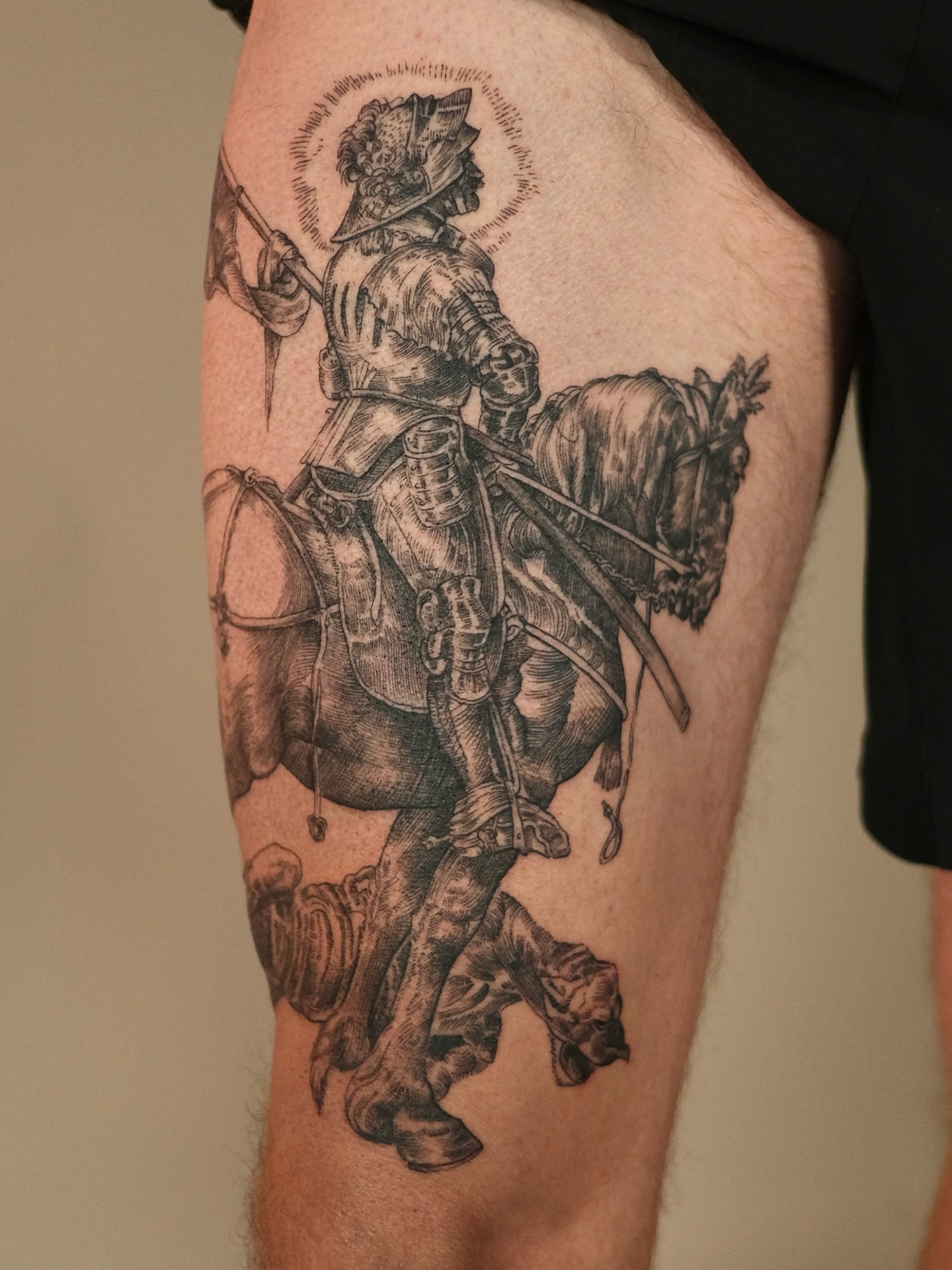 Rider on horseback black and grey tattoo on the thigh by Zanereti