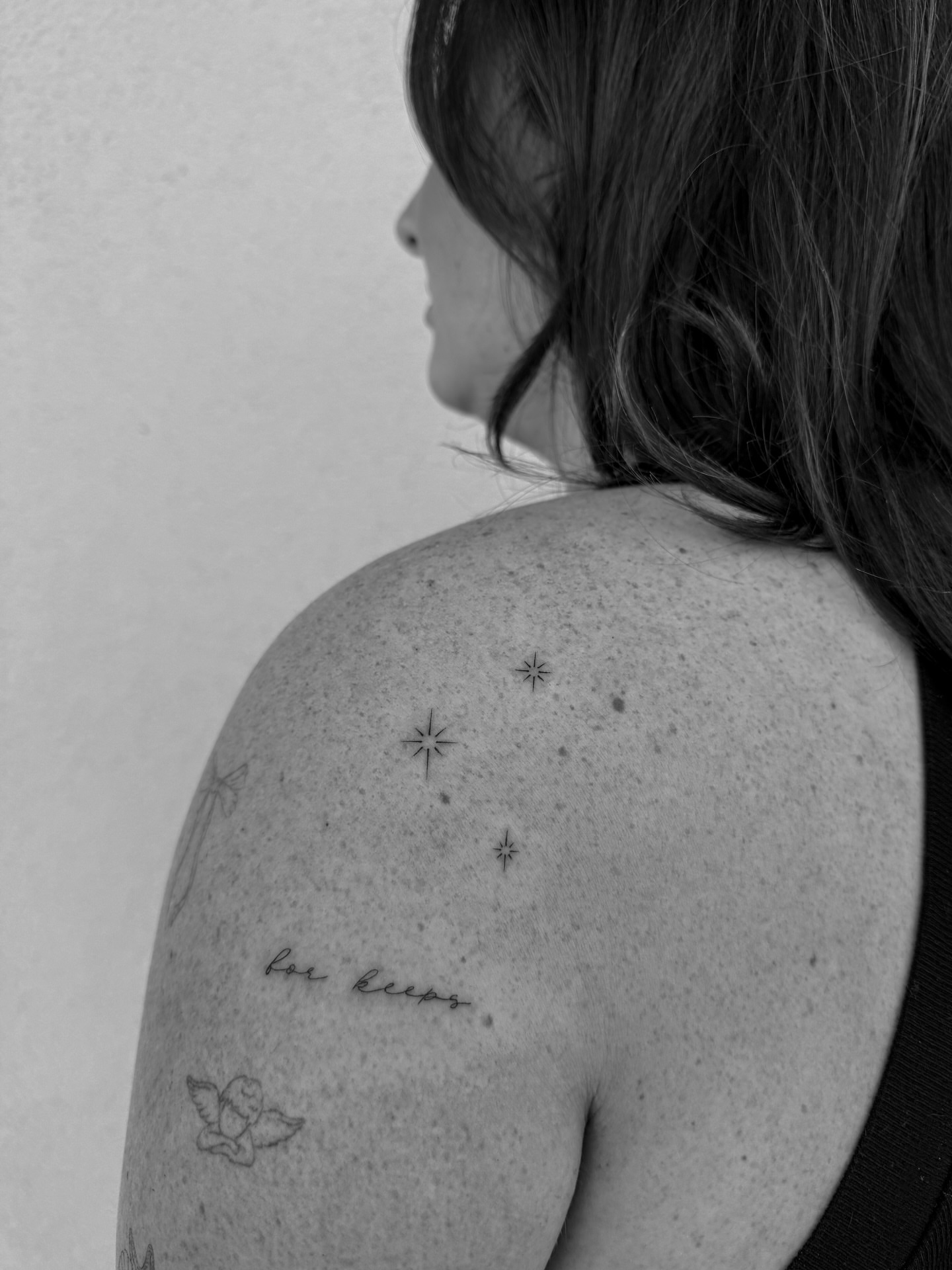 Stars dotwork tattoo on the shoulder by Abby Robinson