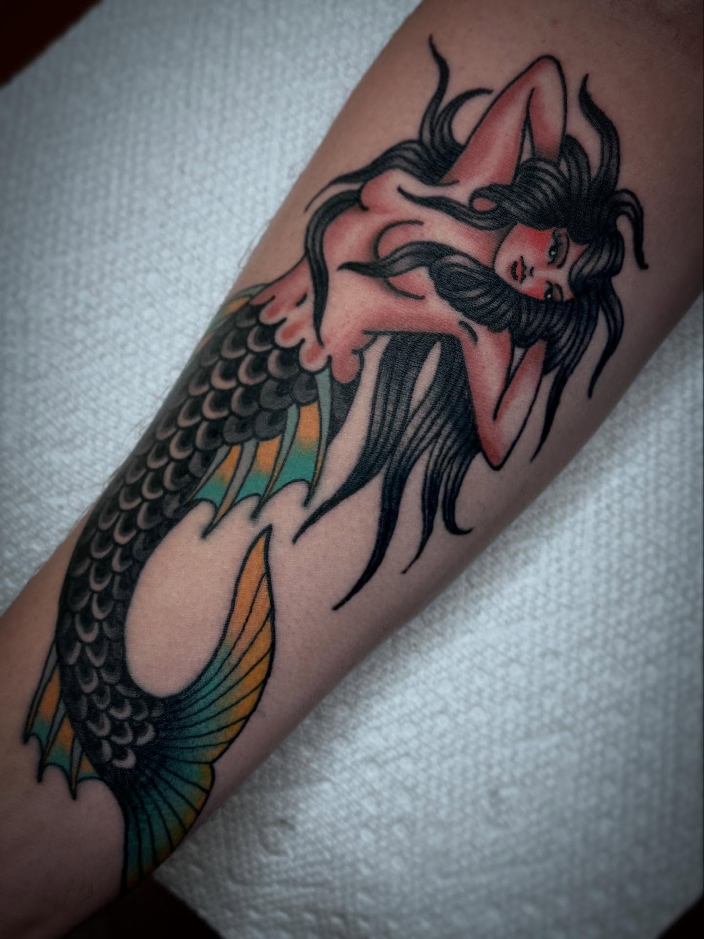 Mermaid American traditional tattoo on the forearm by Drew McElveney, Austin, Texas