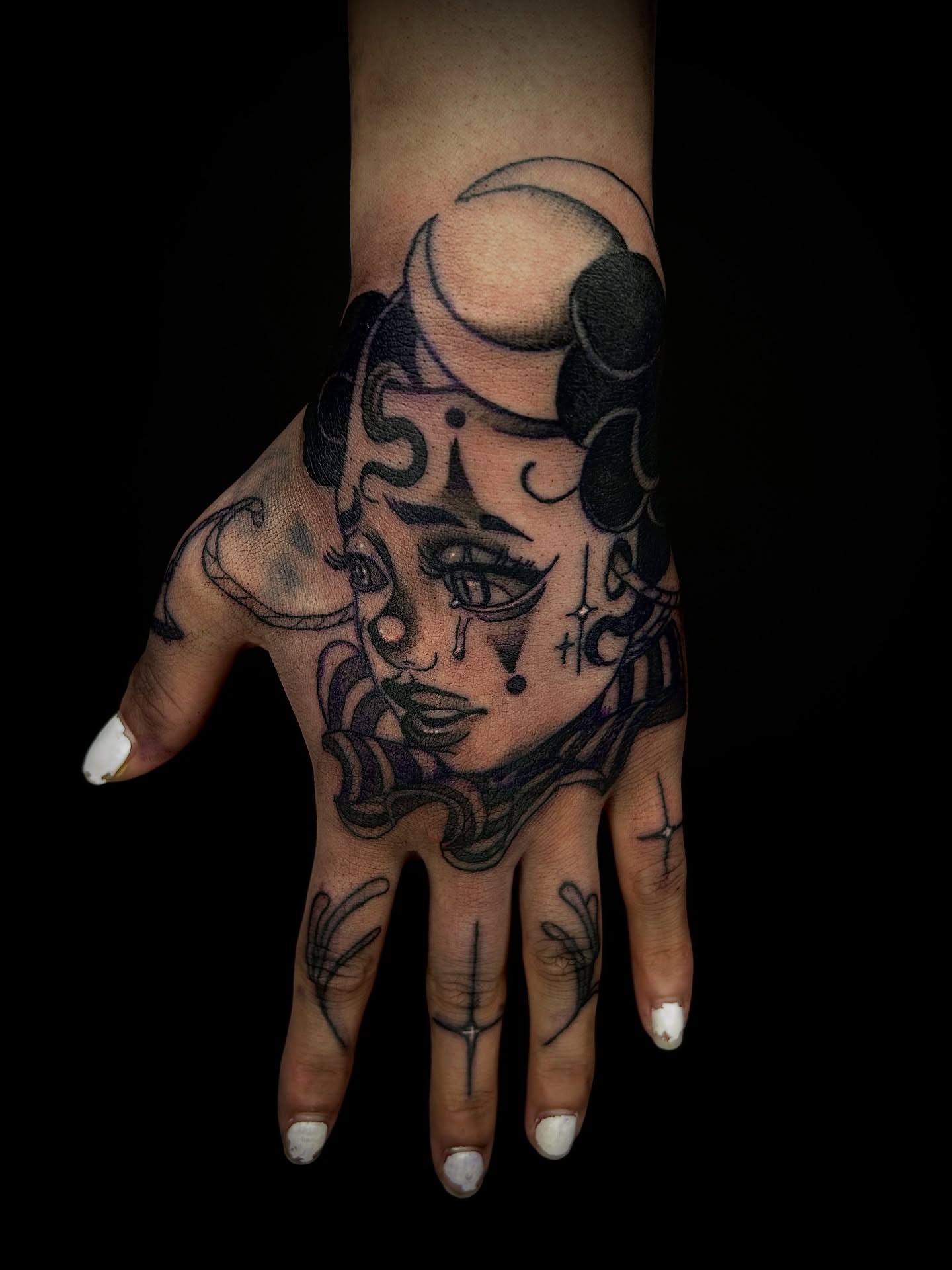 Woman's face dark realism tattoo on the hand by Cleveland Tattoo Artist, Cleveland, Ohio
