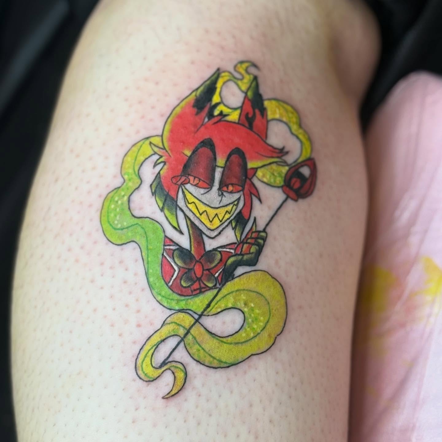 Jester anime tattoo on the upper arm by Bry