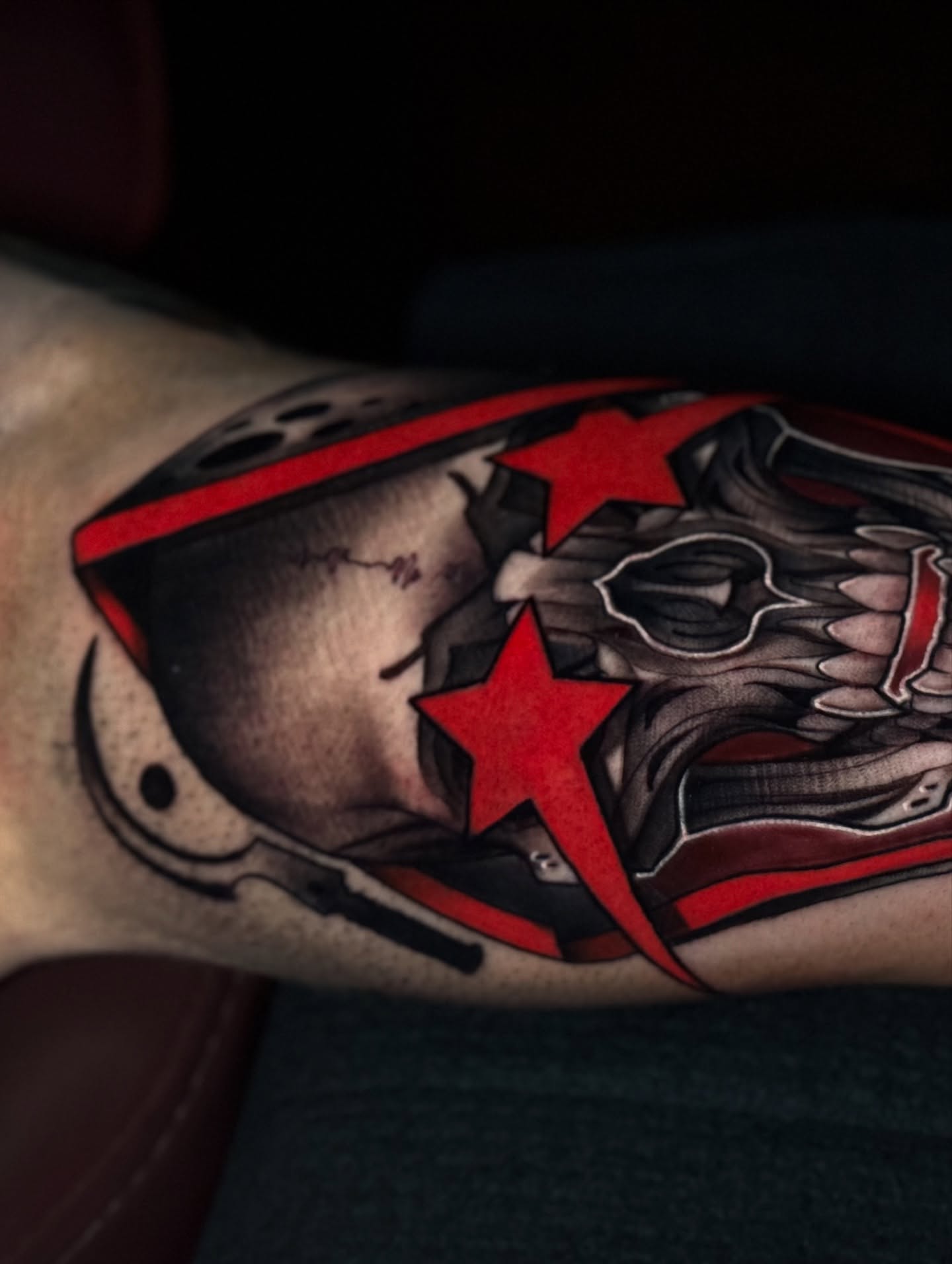 Skull and stars dark realism tattoo on the forearm by Jaxx Kesler