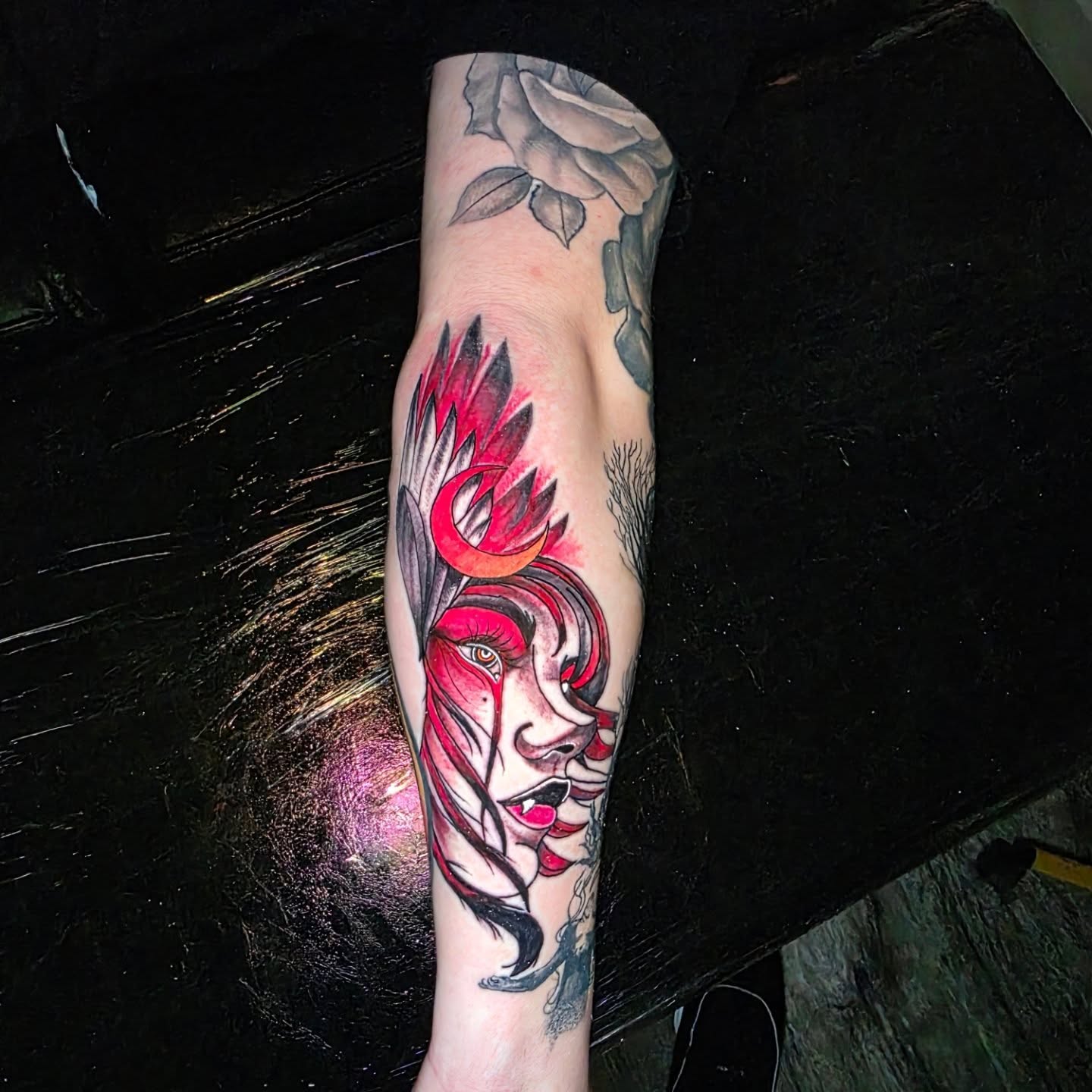 Woman with wings neo-traditional tattoo on the forearm by Dylan Fowler