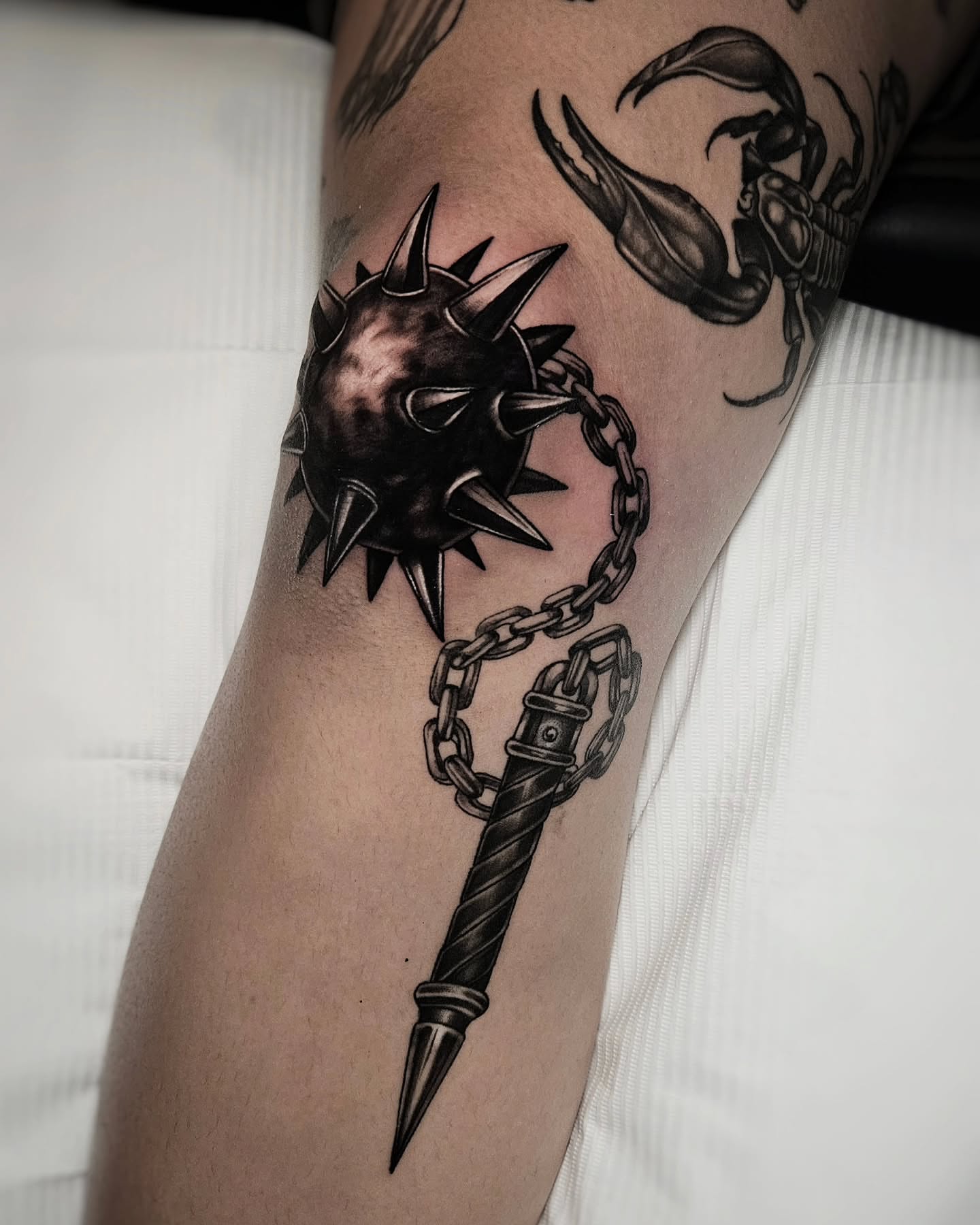 Spiked ball and chain geometric tattoo on the forearm by ʙʀɪᴀɴɴᴀ 𝒁𝑶𝑴𝑩𝑹𝑰𝑬 ᴛᴀᴛᴛᴏᴏꜱ
