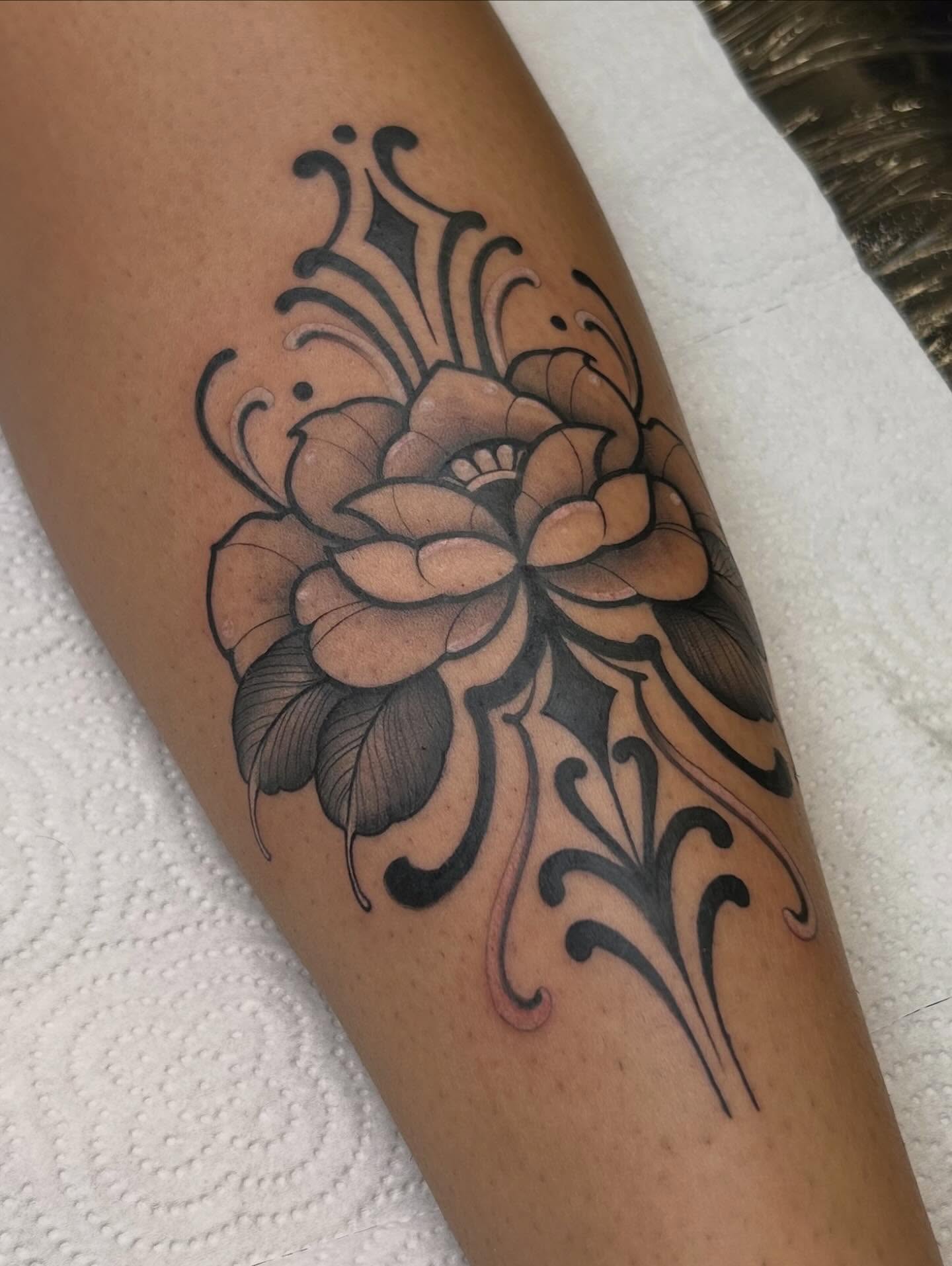 Peony black and grey tattoo on the forearm by Denis Morello de Castro, South River, New Jersey