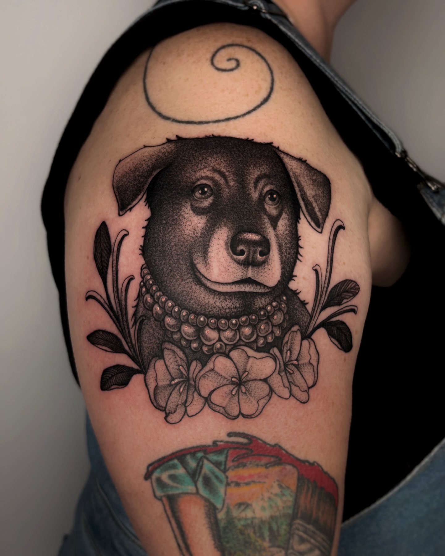Dog wearing pearls American traditional tattoo on the shoulder by Kuya, Berkeley, California