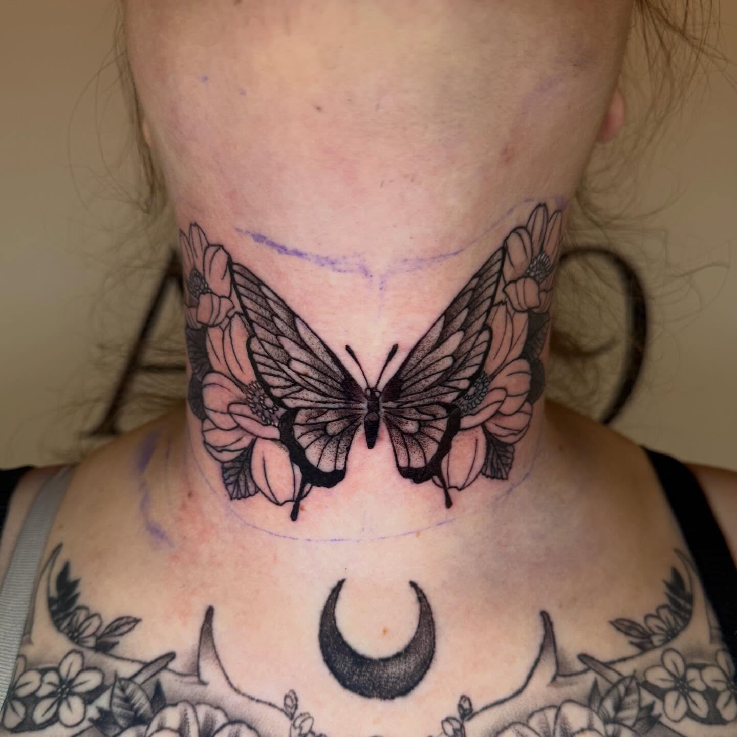 Butterfly and flowers black and grey tattoo on the neck by Paul Calhoun Tattoos, Englewood, Ohio
