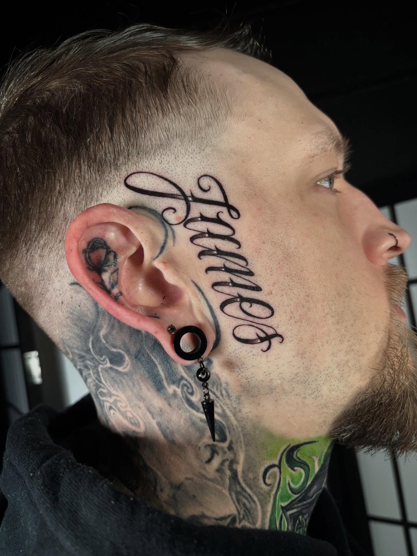 Script lettering lettering script tattoo on the neck by Trusty Dizon Tattoo Artist