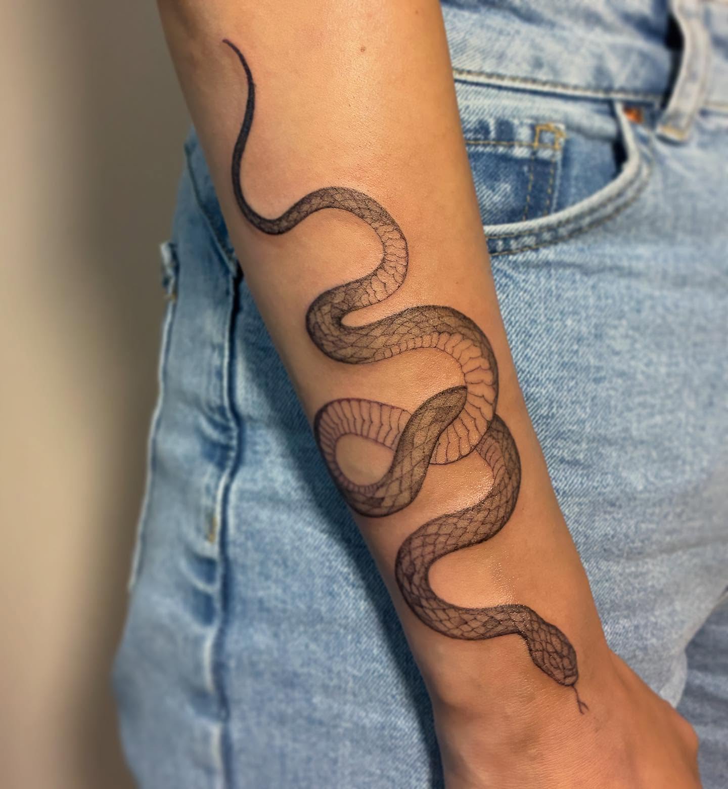 Snake black and grey tattoo on the forearm by Shamalee Delacruz✨