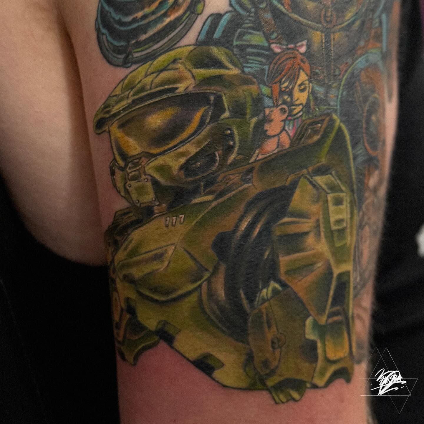 Halo armor and character realism tattoo on the forearm by Zhorana Devi