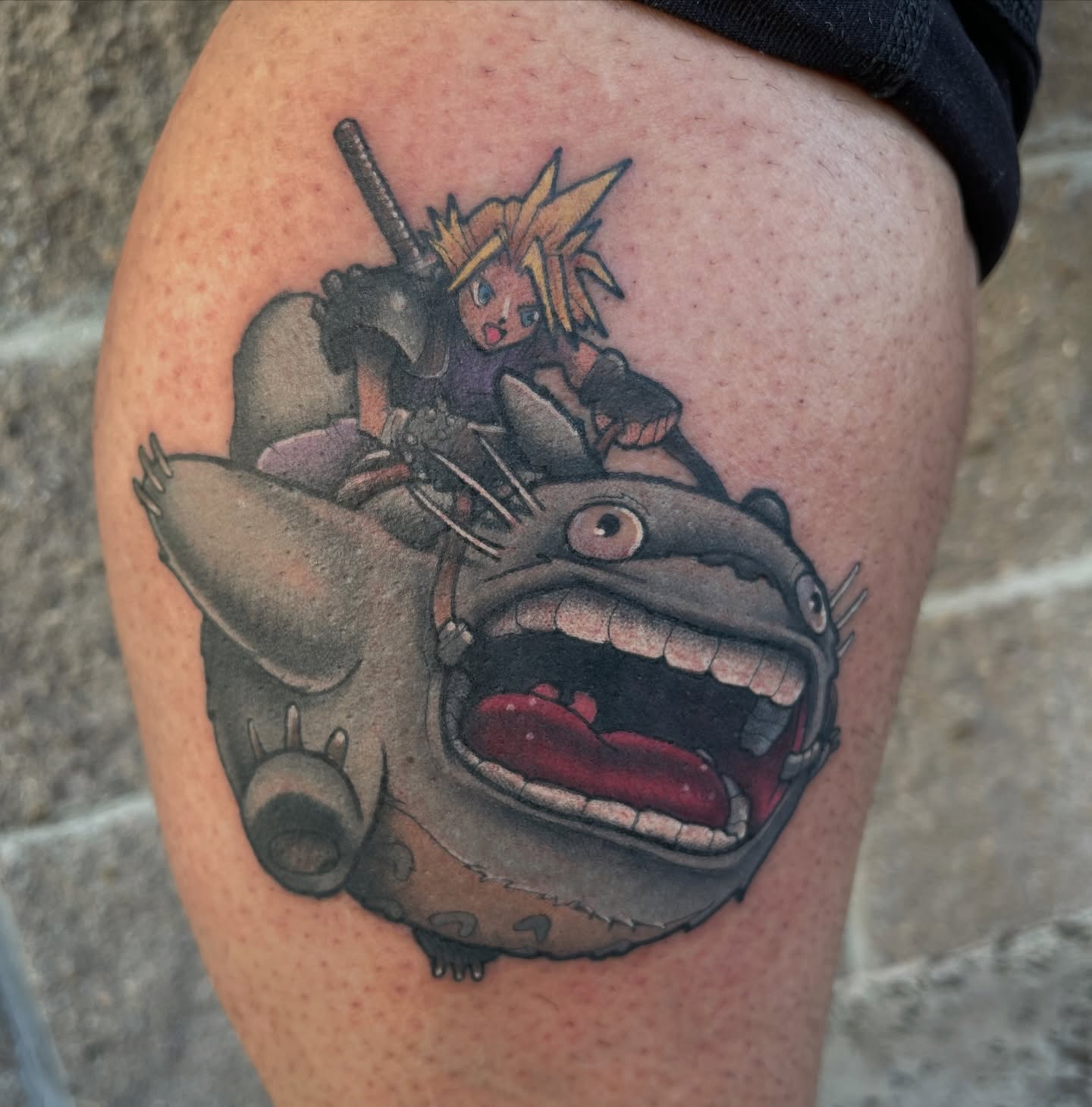 Cloudy knight riding totoro anime tattoo on the thigh by Chris Sparks, I just go by Sparks.