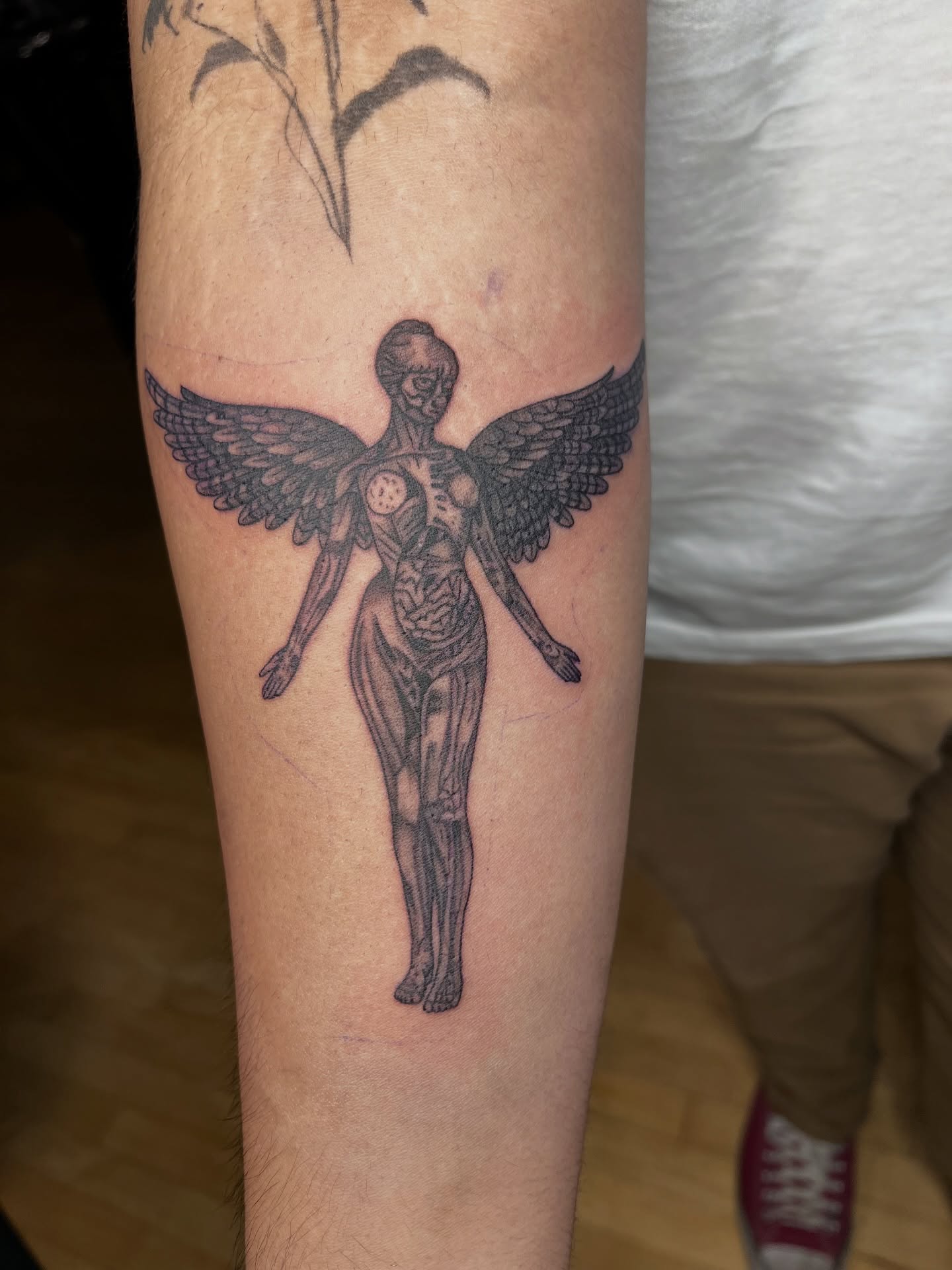 Tattoo by @lovelyinink_ — black_and_grey, realism