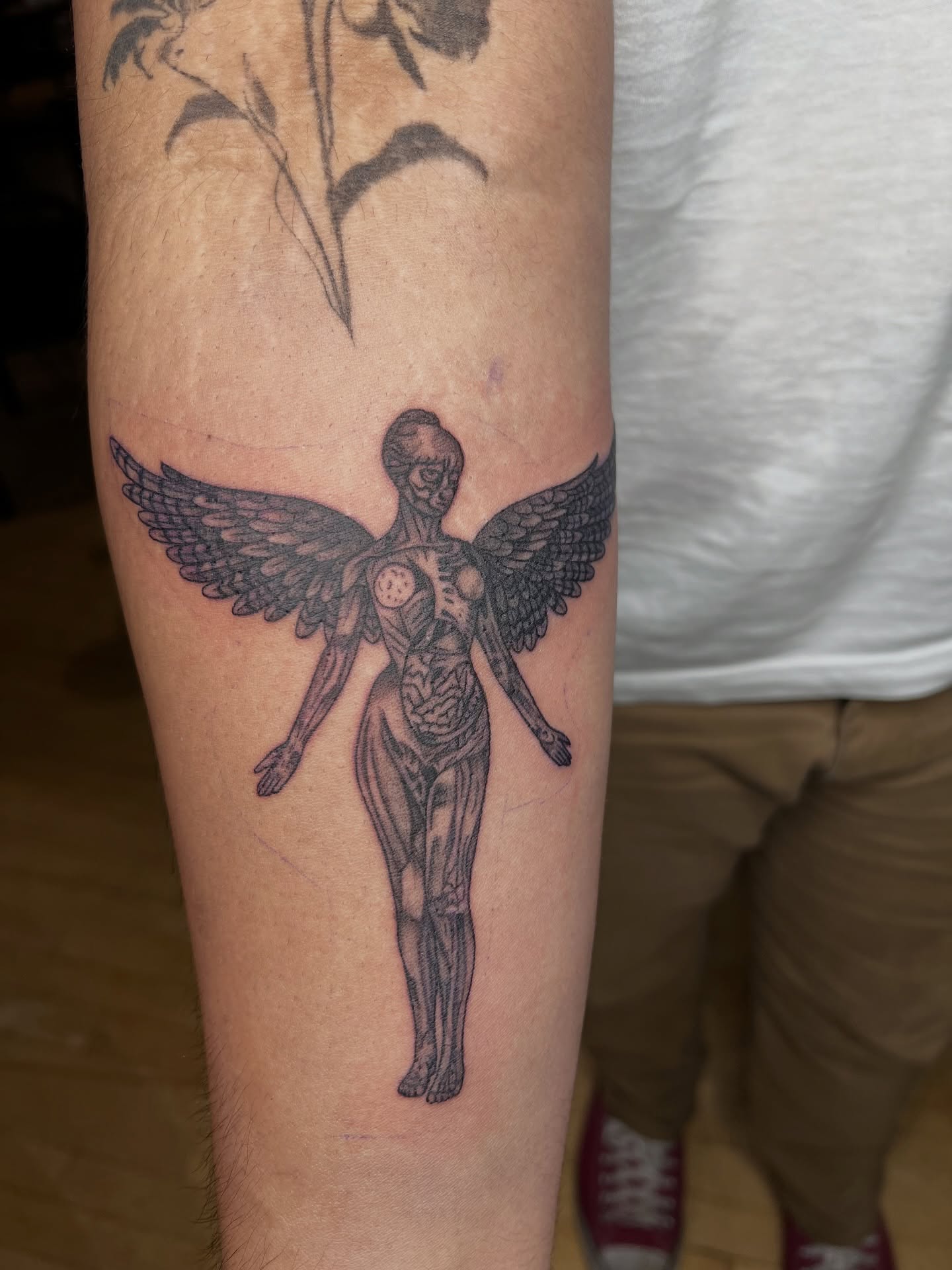 Tattoo by @lovelyinink_ — black_and_grey, realism