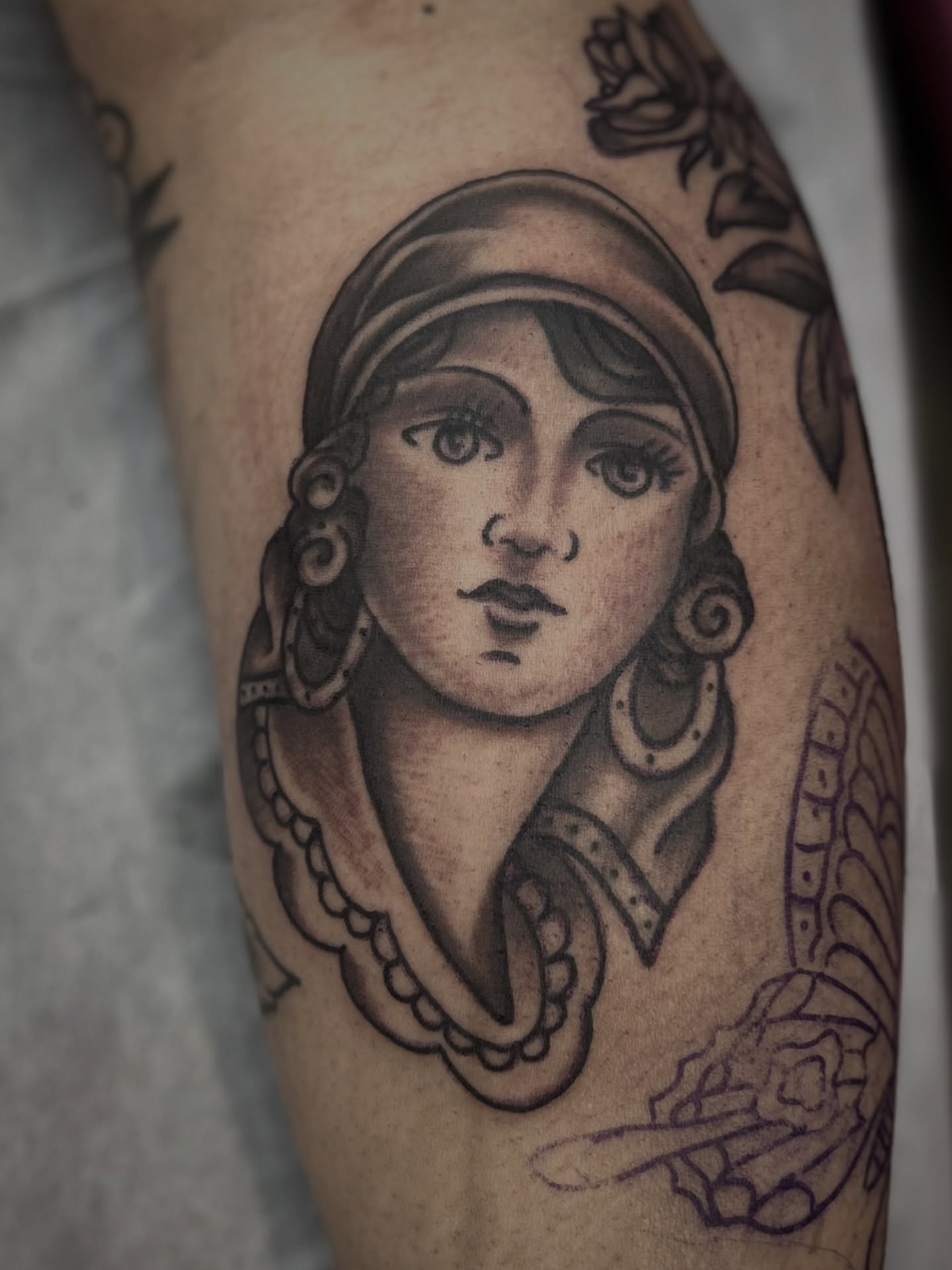 Woman's portrait realism tattoo on the forearm by Ryan Willard, Denver, Colorado