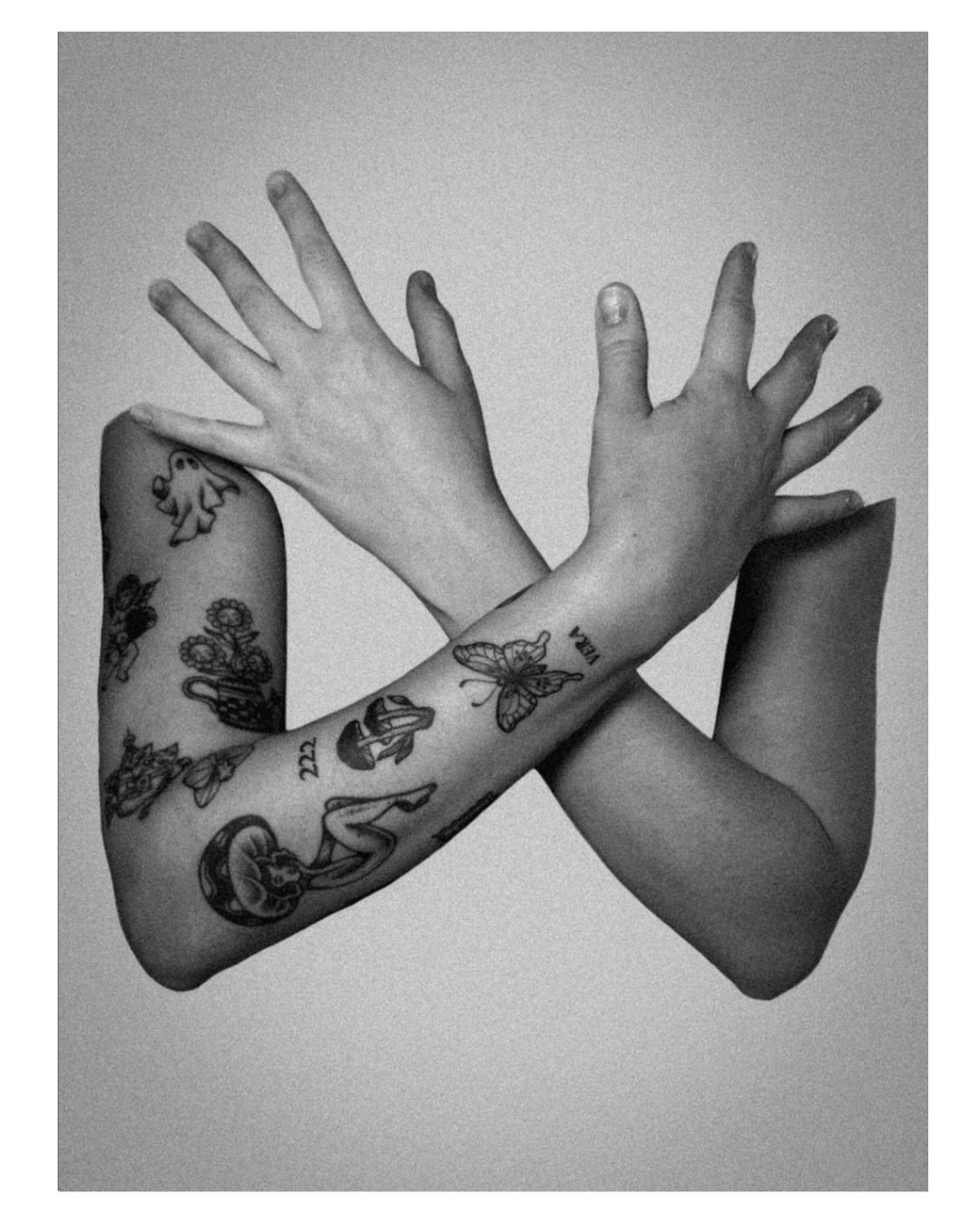 Tattooed arms American traditional tattoo on the upper arm by Jordyn Tinney