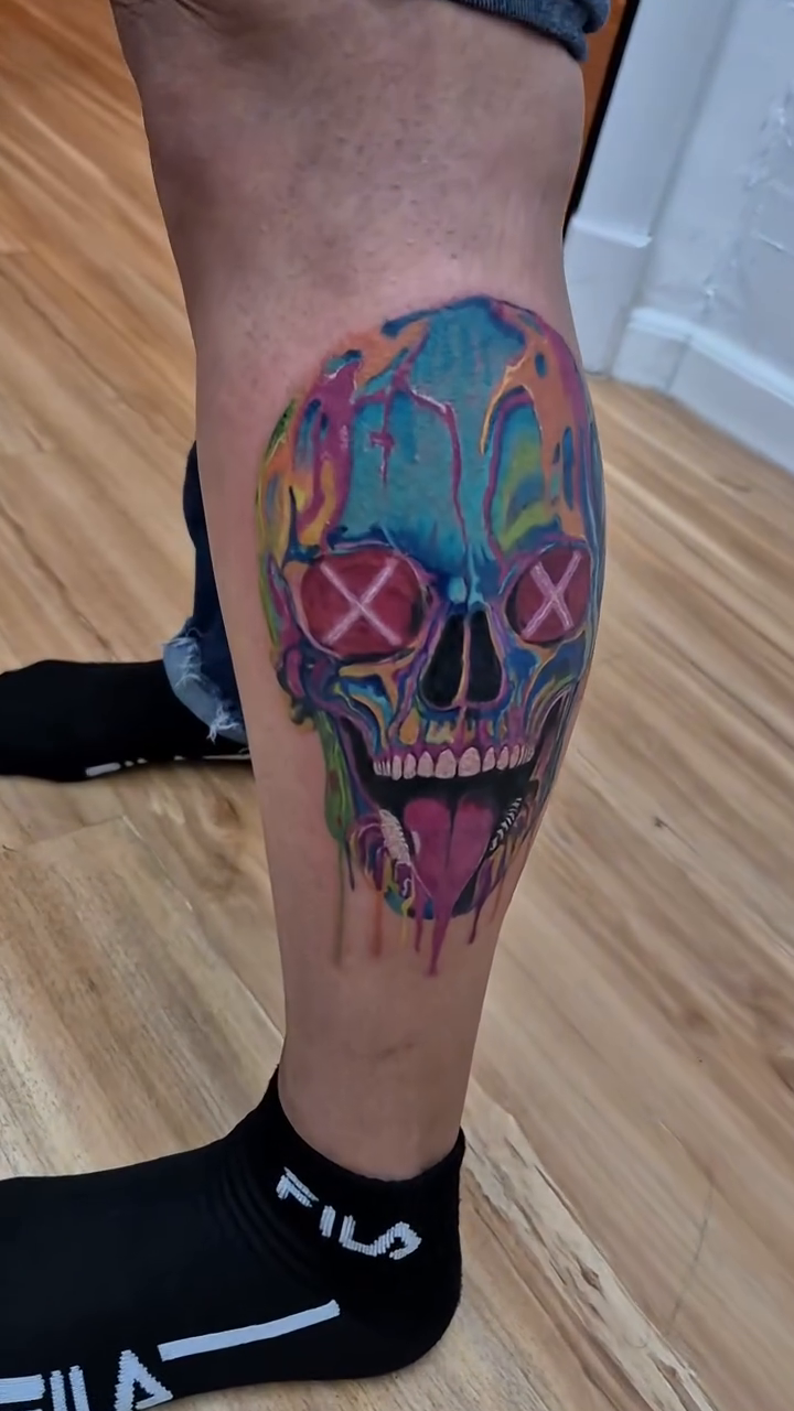 Skull with dripping paint new school tattoo by Chris TL Jones