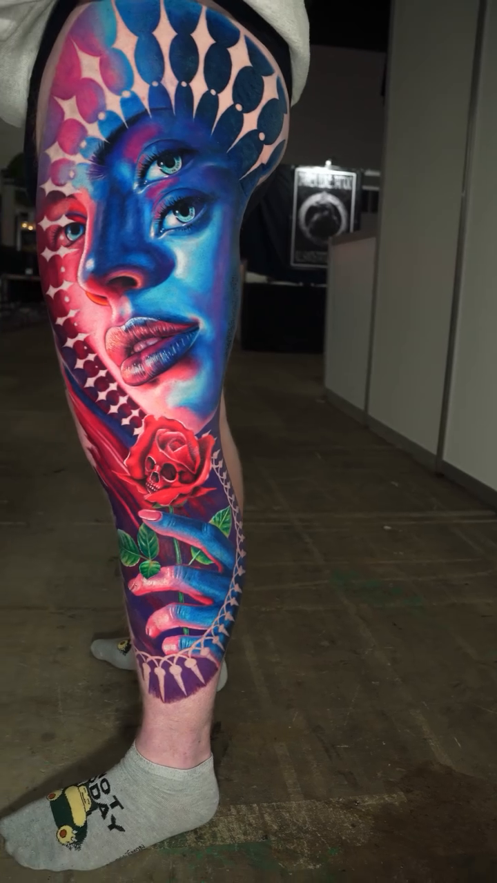 Surreal face with roses and zipper surrealism tattoo on the forearm by Hiroto Nguyen, Perth, Western Australia