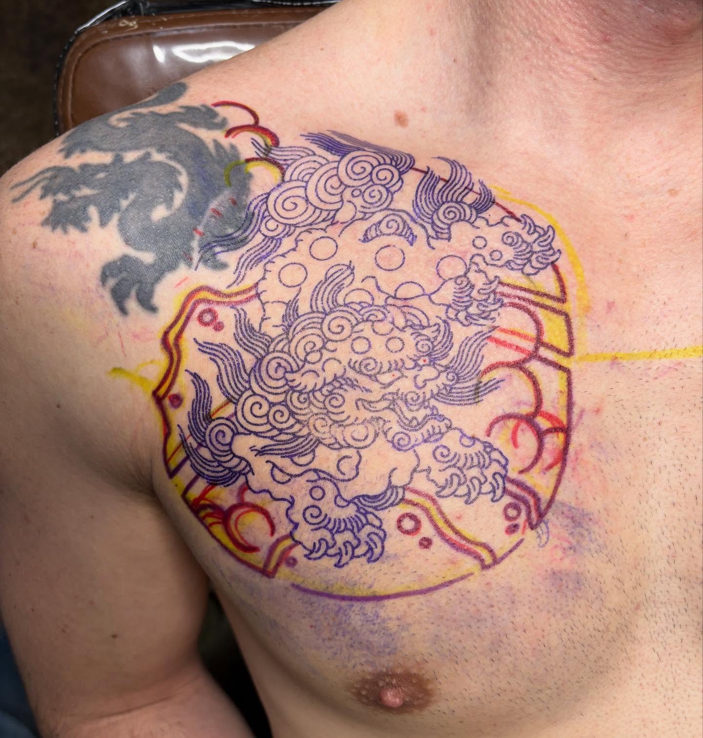 Mythical creature dotwork tattoo on the chest by Jakob Ristau, Kansas City, Missouri