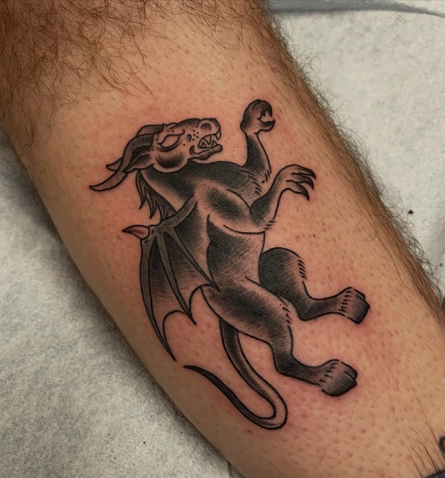 Gargoyle black and grey tattoo on the forearm by Andres Patino 🇪🇨🇺🇸