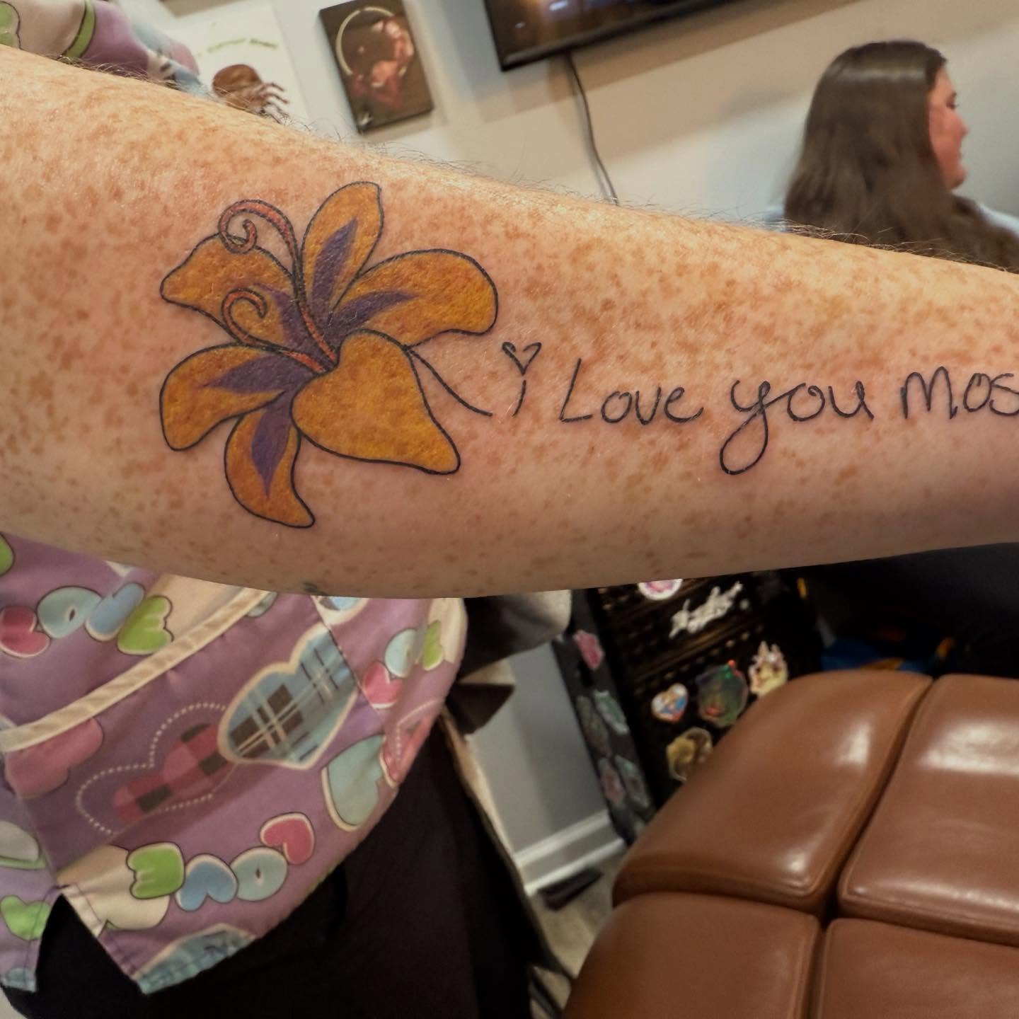 Flower and phrase new school tattoo on the forearm by Brandie Caroline, Somers Point, New Jersey