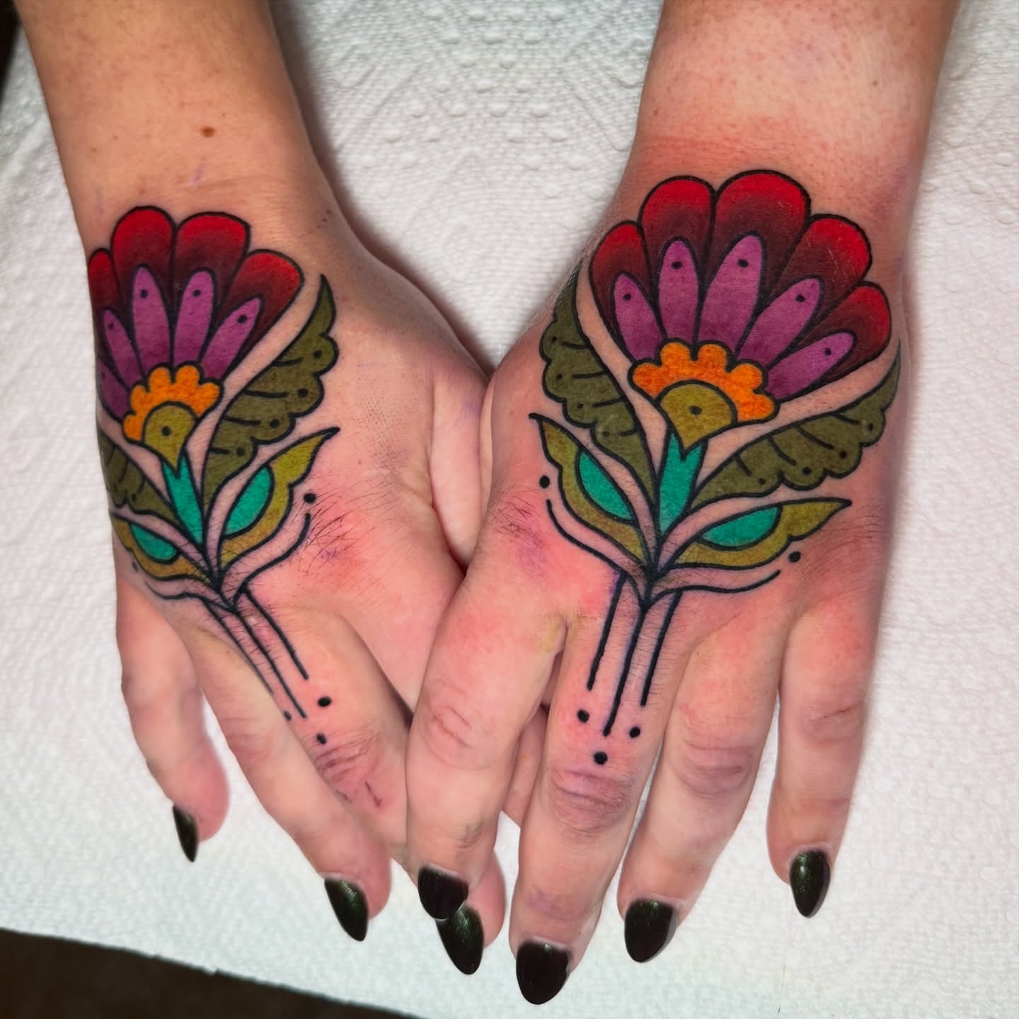 Floral design American traditional tattoo on the hand by 🍄Annie Burkhard🍄, Indianapolis, Indiana