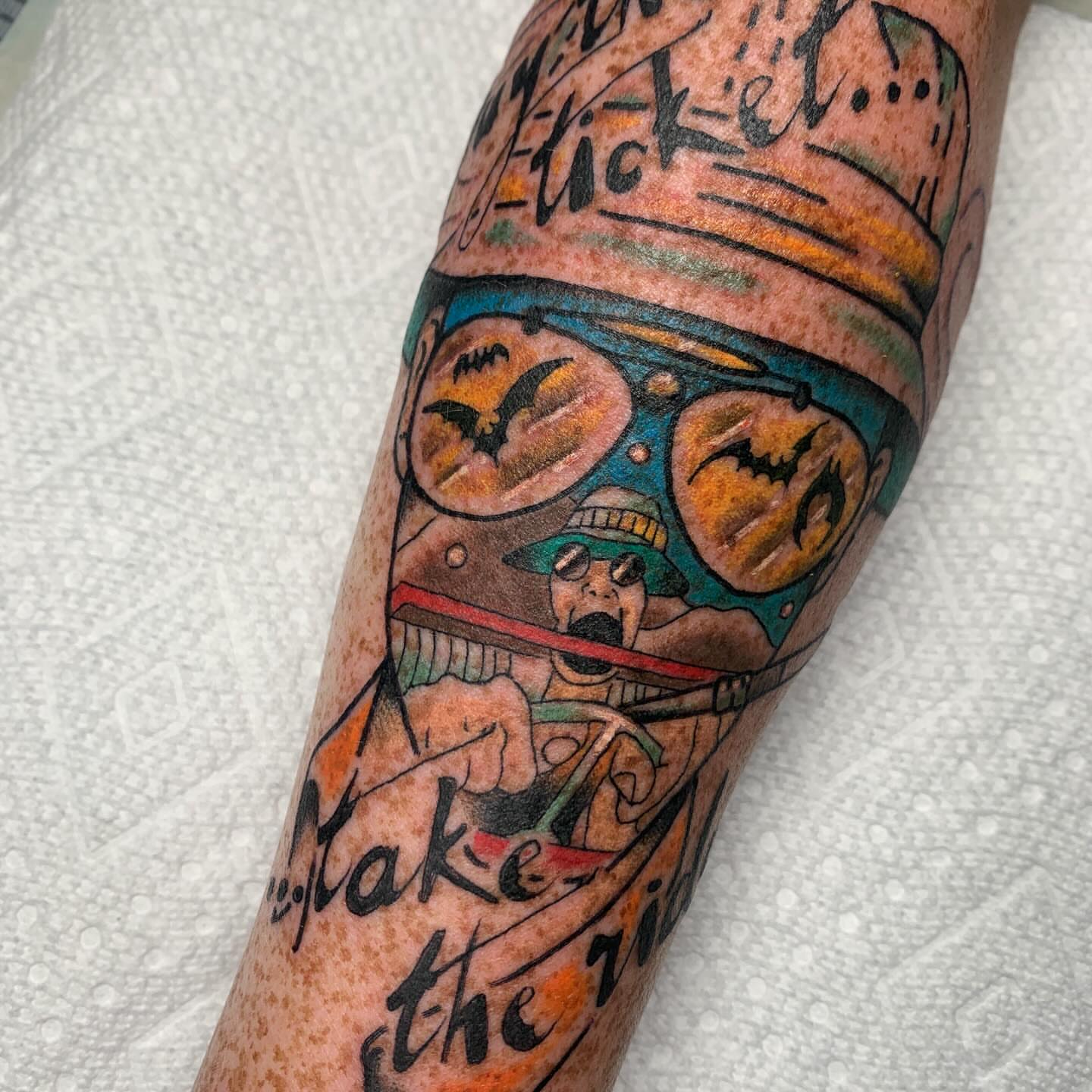 Batman-themed character American traditional tattoo on the forearm by April Morris ⚔️ Tattoo Goblin