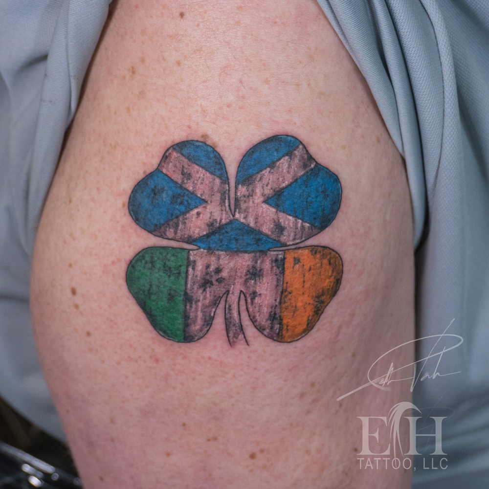 Clover dotwork tattoo on the thigh by Donald Voelker