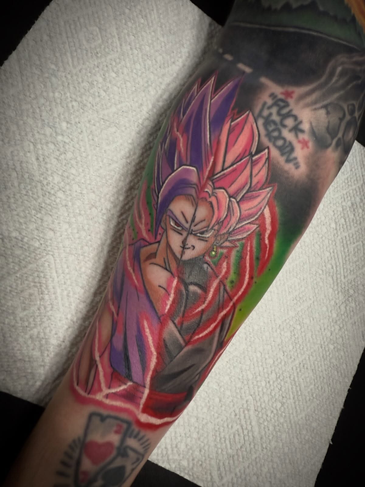 Dragon ball character anime tattoo on the forearm by Abby Hofman