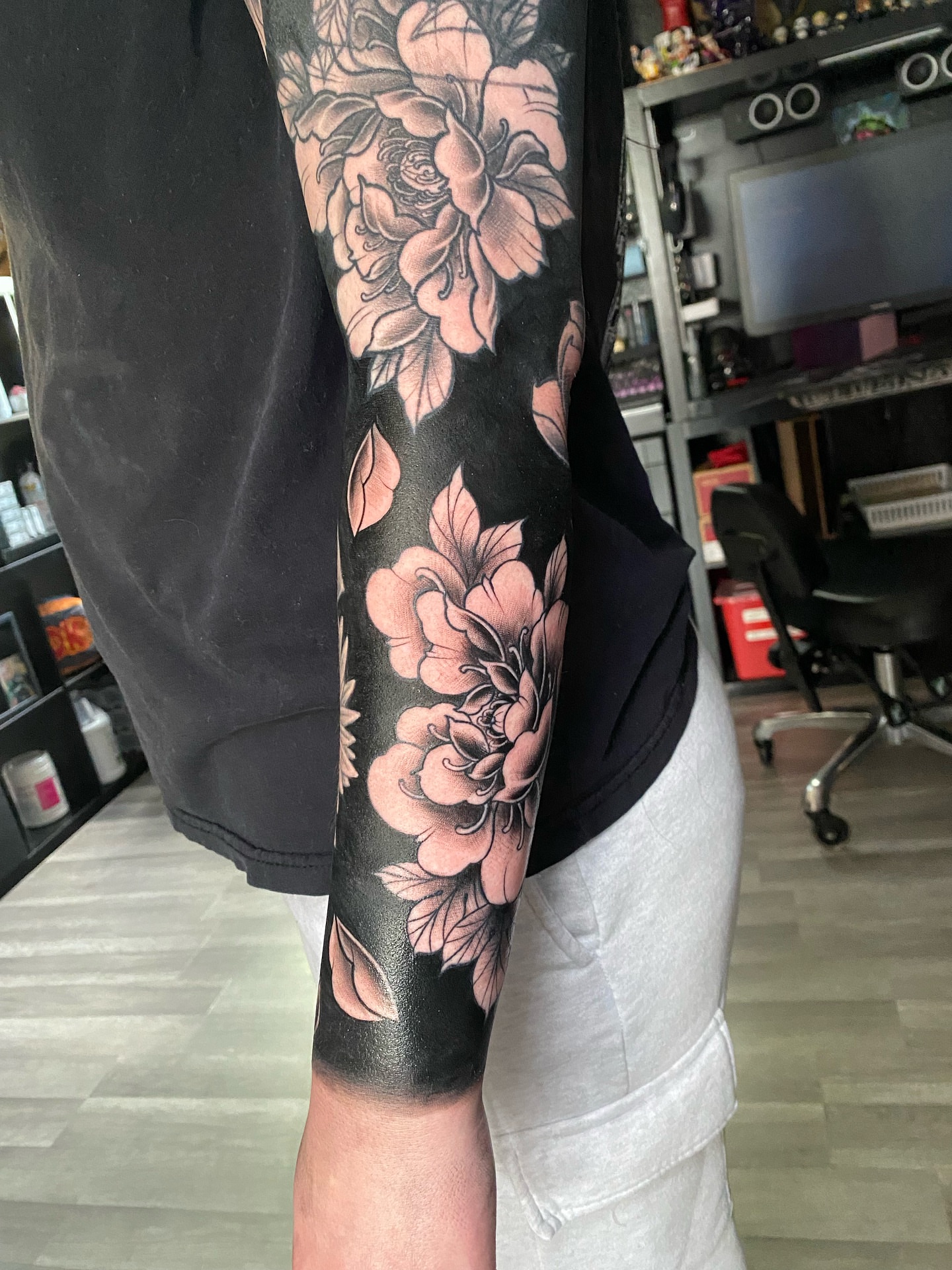 Peonies and leaves Japanese tattoo on the forearm by Tattertot