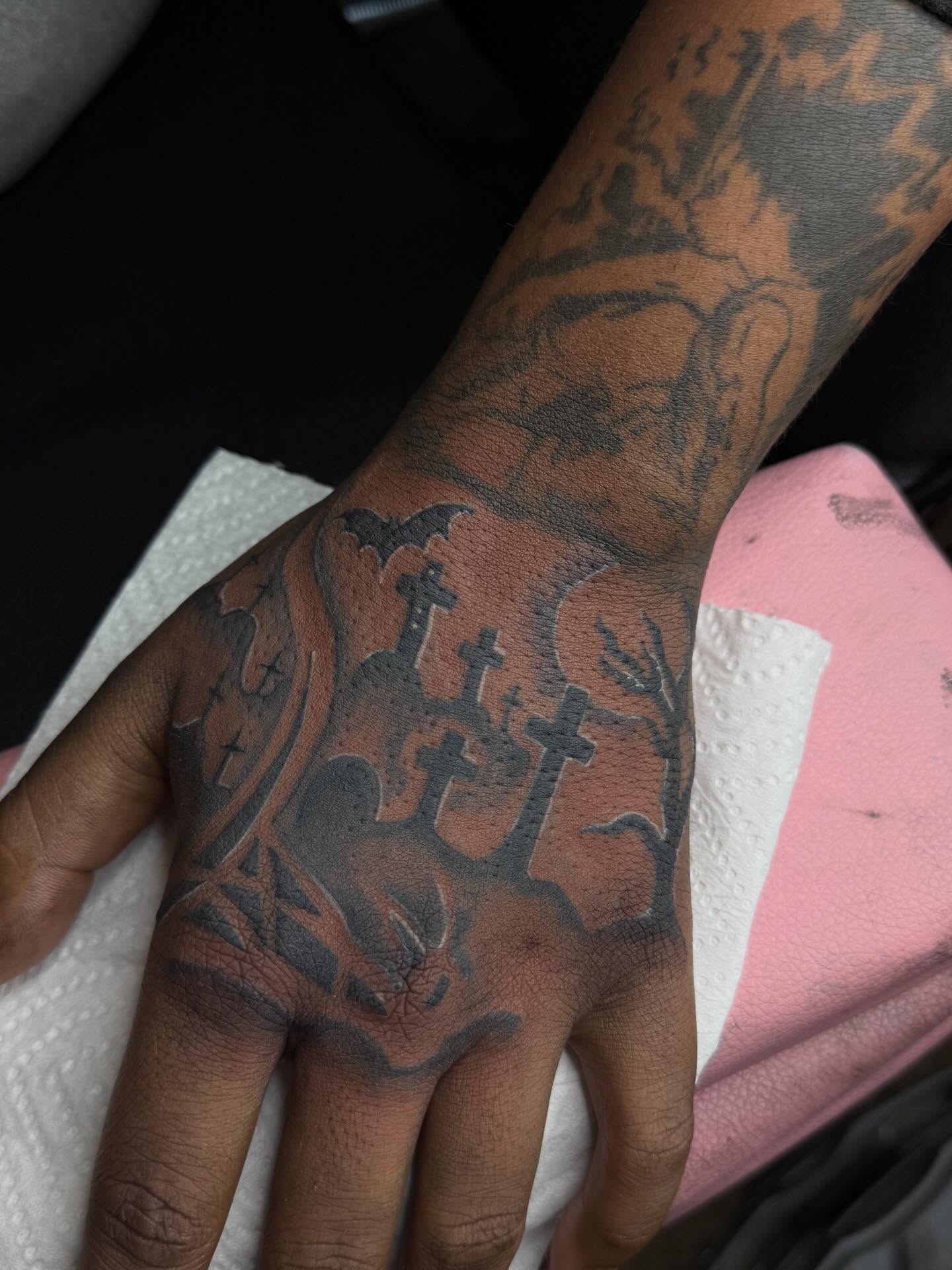 Graveyard black and grey tattoo on the hand by Destini