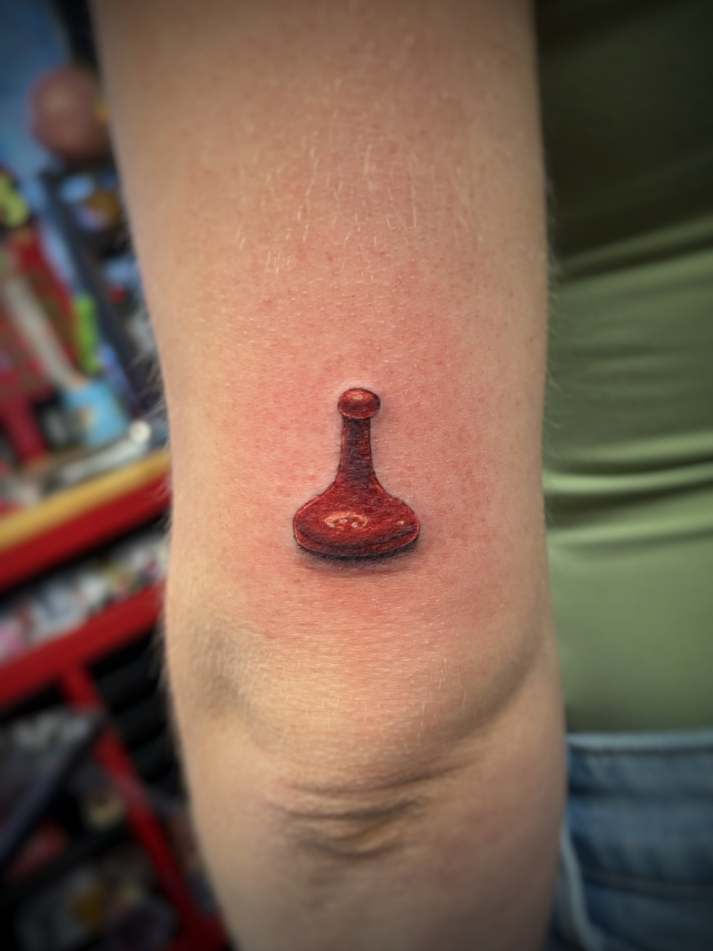 Joystick realism tattoo on the forearm by sam cedar geller 🐝