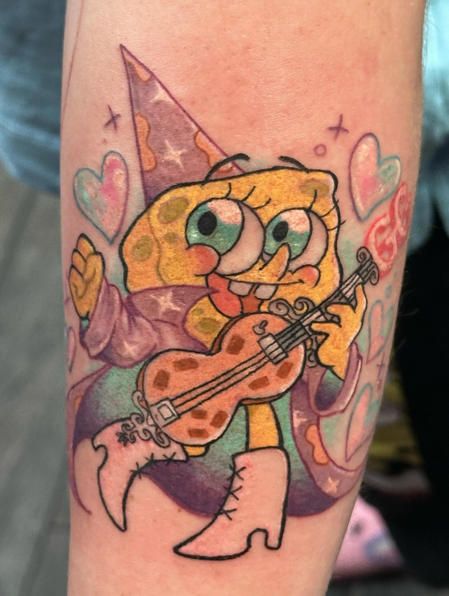 Spongebob playing guitar new school tattoo on the forearm by ✦ Louie ✦, Sterling Heights, Michigan