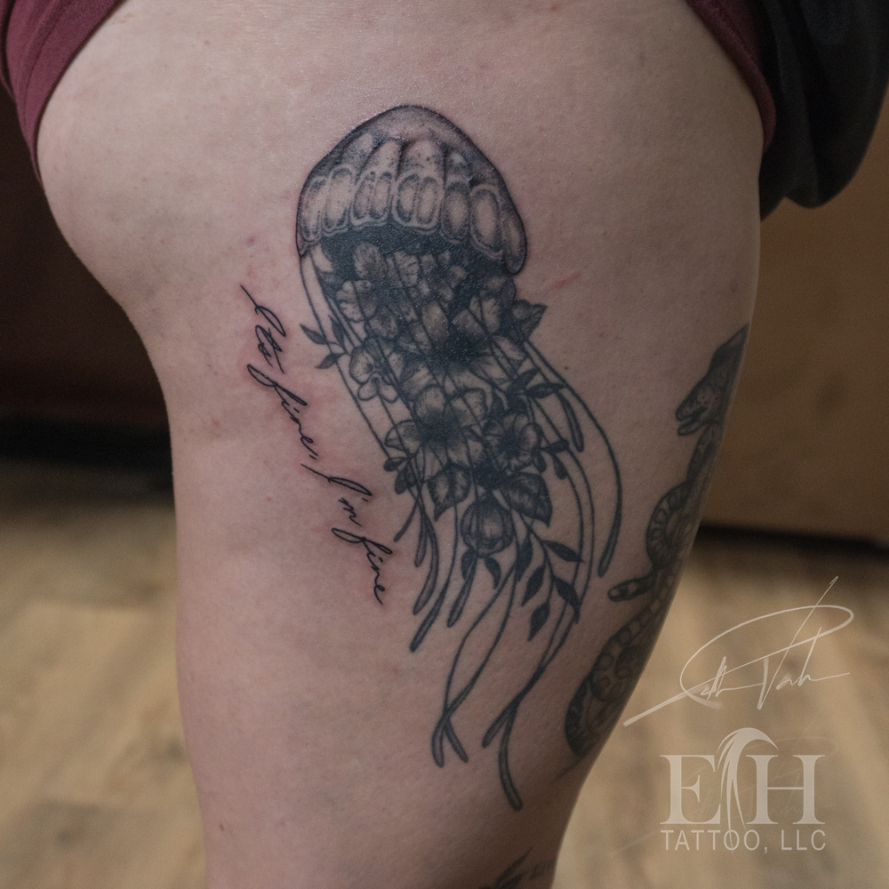 Jellyfish realism tattoo on the thigh by Donald Voelker