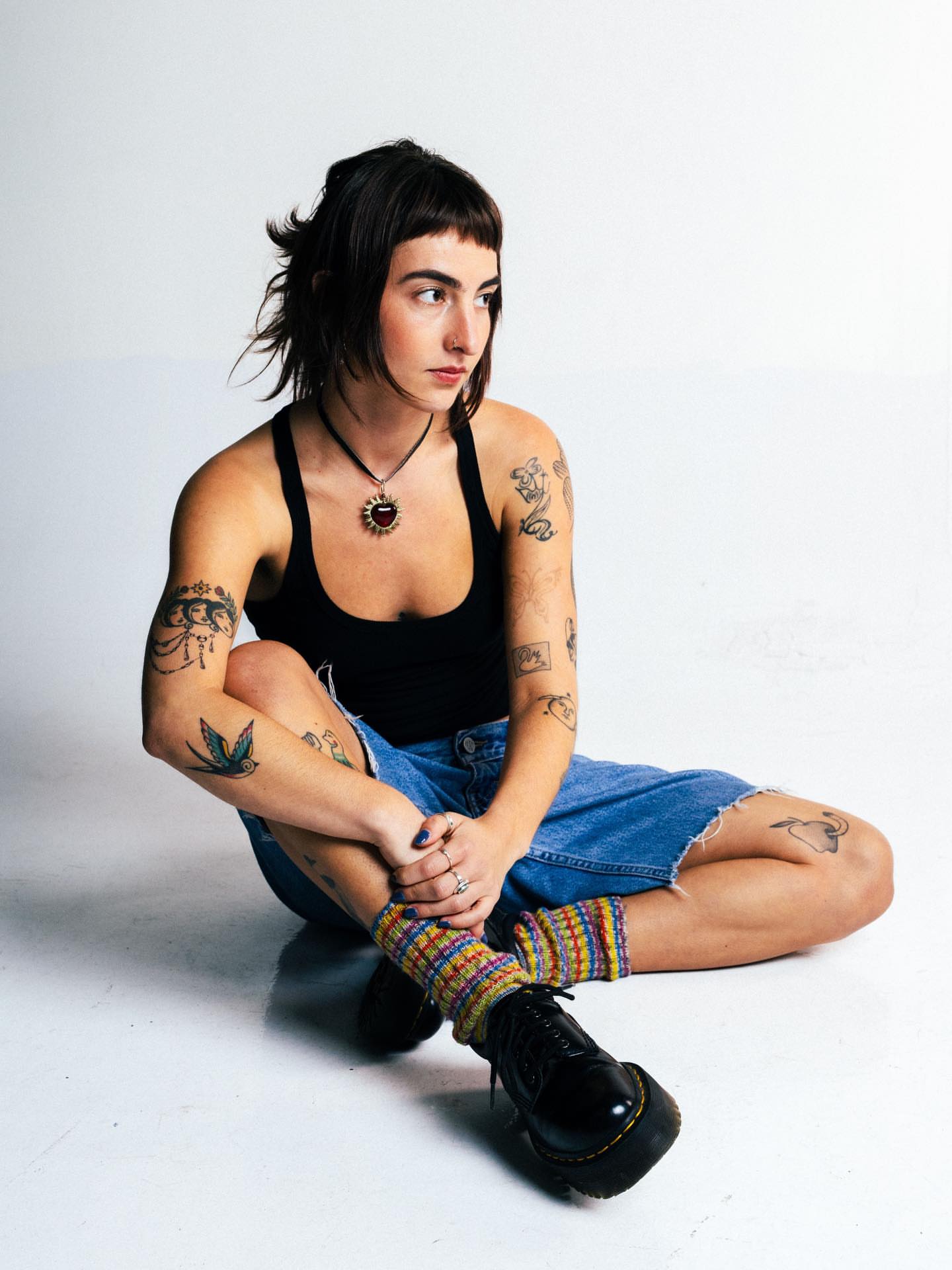 Tattooed arms American traditional tattoo by nina