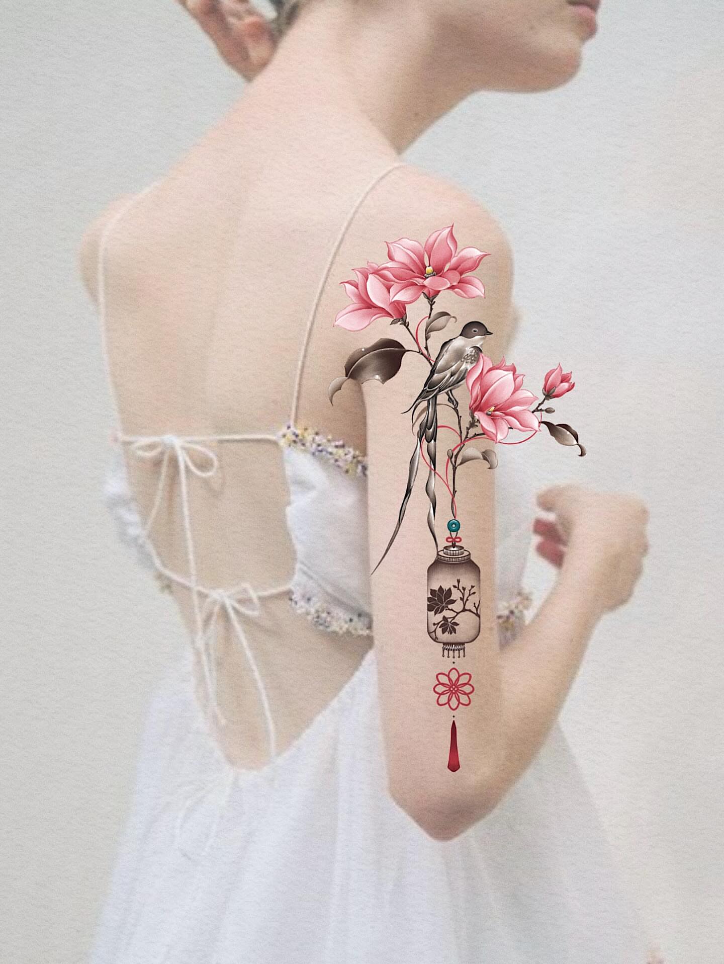 Bird and flowers illustrative tattoo on the upper arm by 애박 ⋆⁺₊ ₊⁺⋆ Aebak