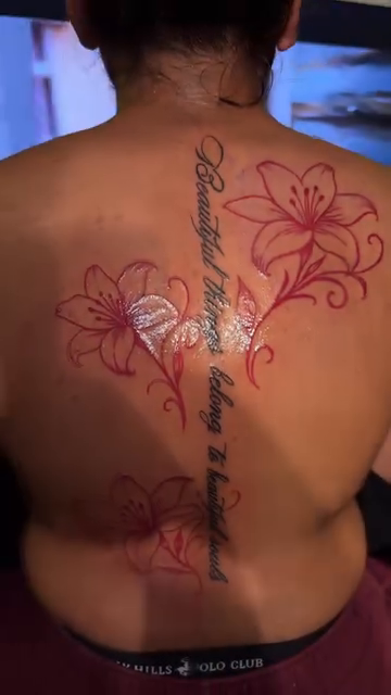 Floral spine tattoo with script fine line tattoo on the back by Mi♥️Amor♥️Ink