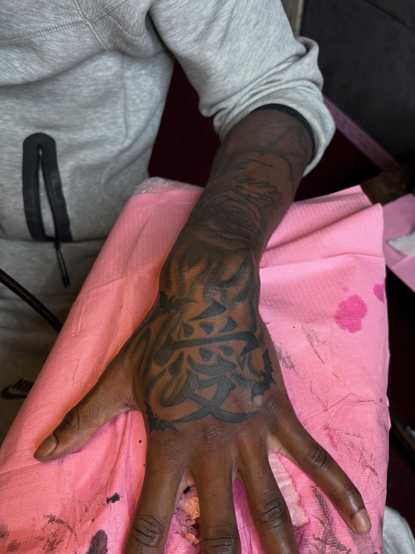 Floral design black and grey tattoo on the hand by Barbinks Studio🎀