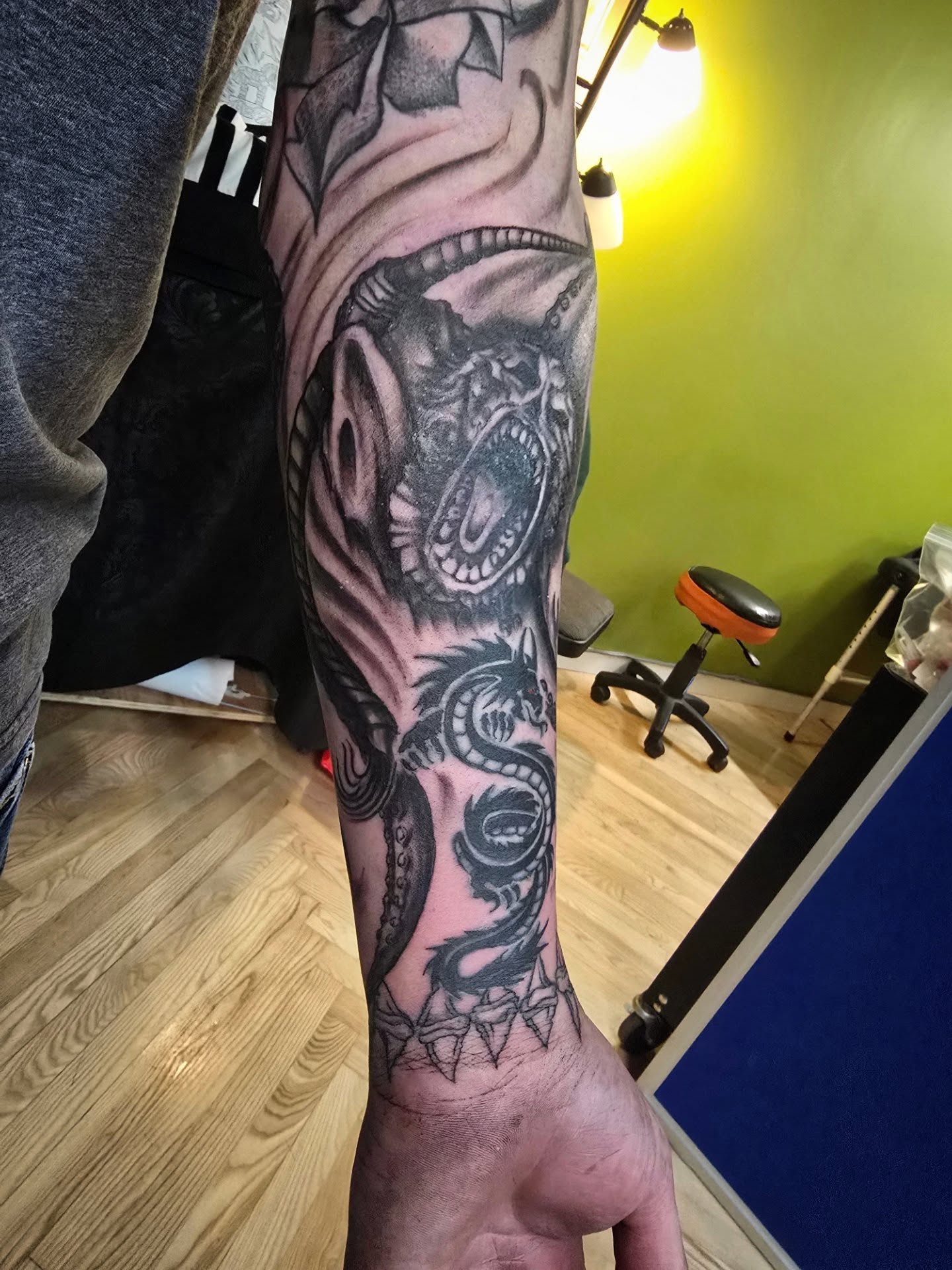 Tattoo by @tatpandaink — black_and_grey, dark_realism