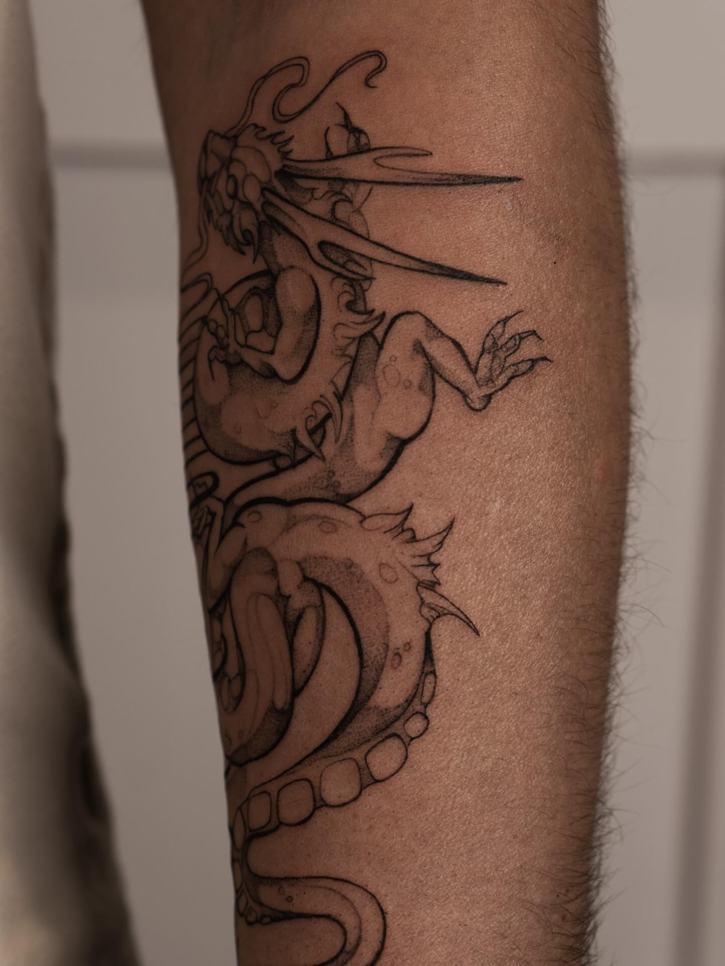 Dragon black and grey tattoo on the forearm by ᴛᴀᴛᴛᴏᴏ ᴀʀᴛɪꜱᴛ 📍Portland, OR
