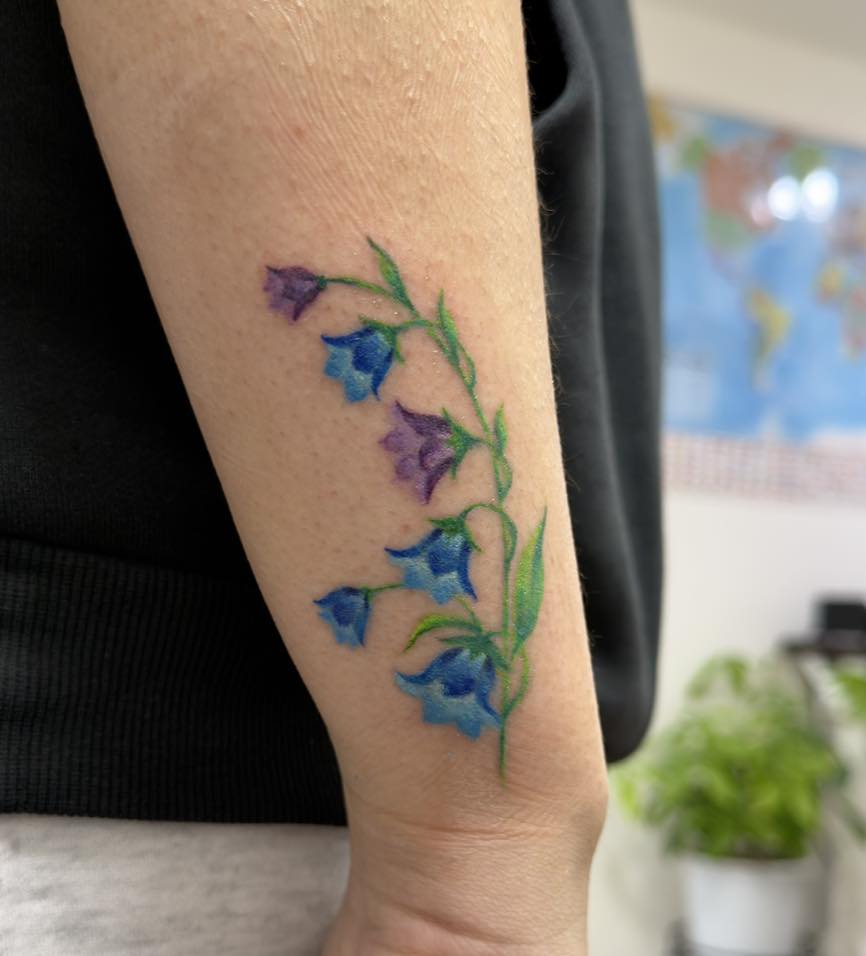 Tattoo by @juliabodyart — watercolor