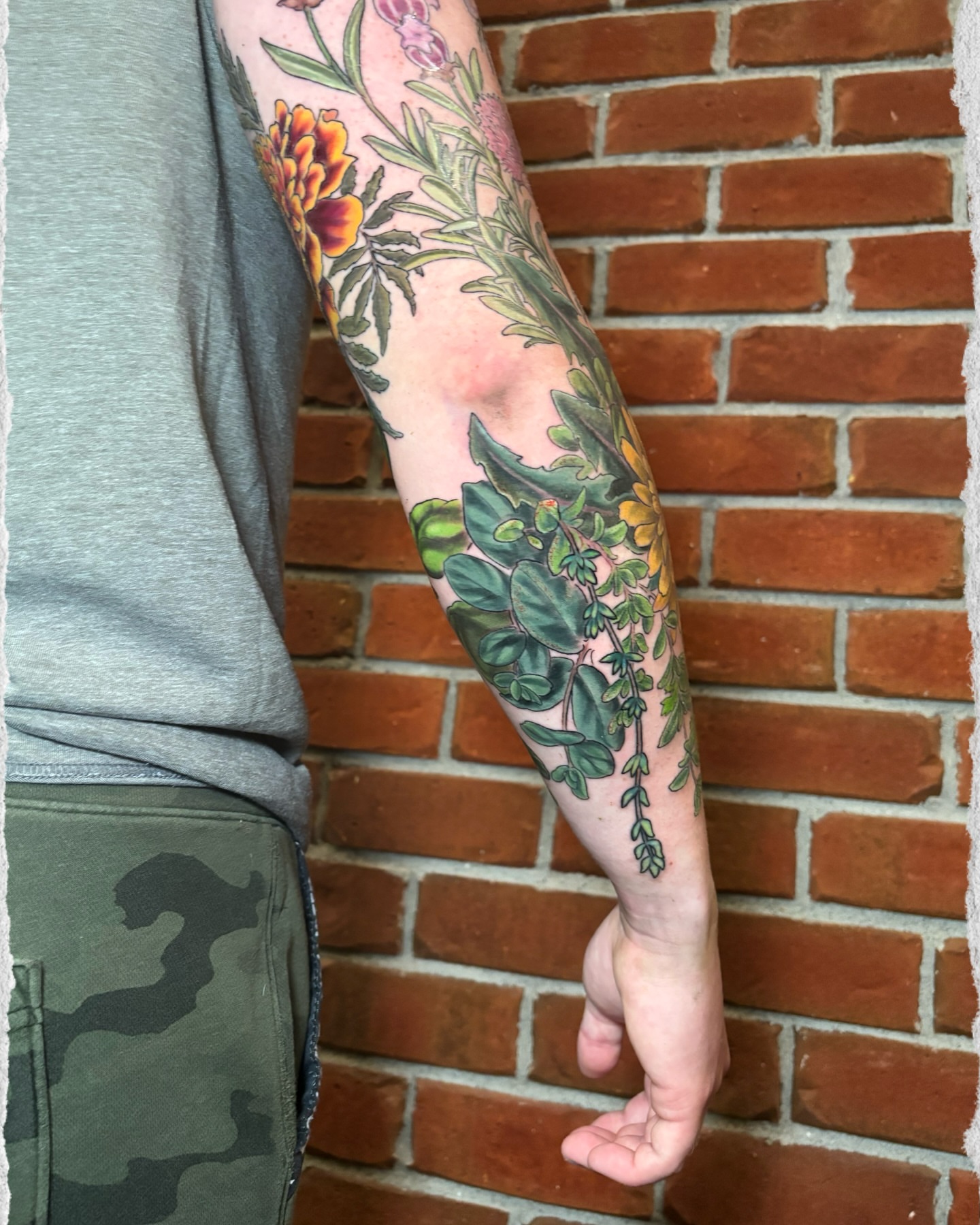 Botanical realism tattoo on the forearm by Meg Mayhem ๐จ Sarenity Tattoo