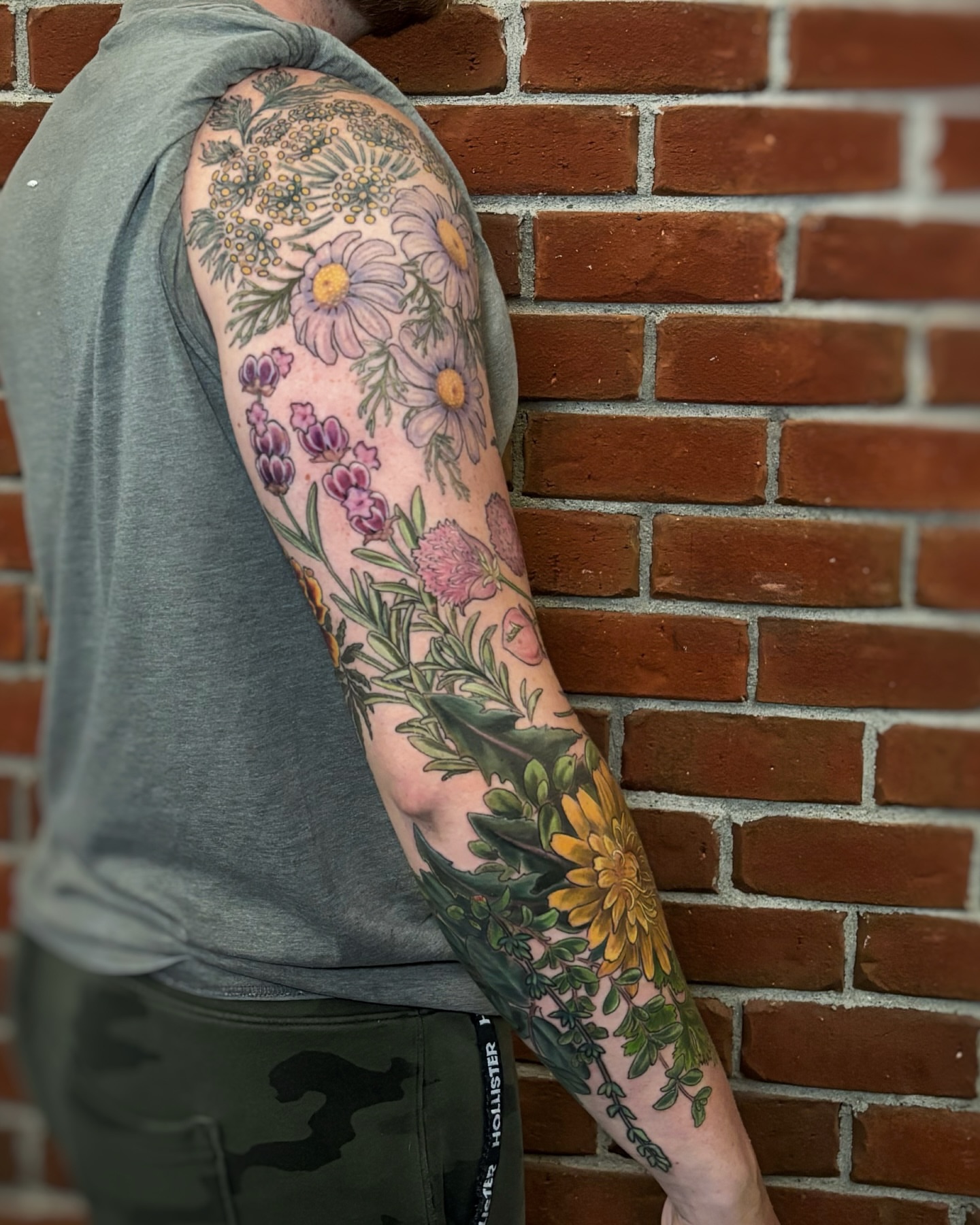 Floral bouquet realism tattoo on the forearm by Meg Mayhem ๐จ Sarenity Tattoo