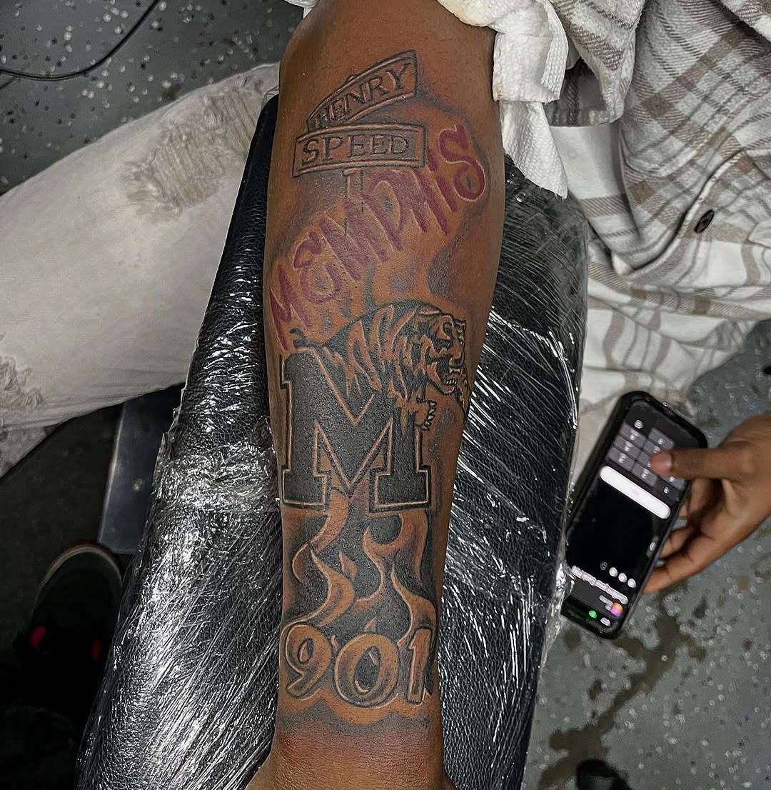 Memphis street signs and tiger realism tattoo on the forearm by TreCashTats💉🩸 MisfitzTattooStudio
