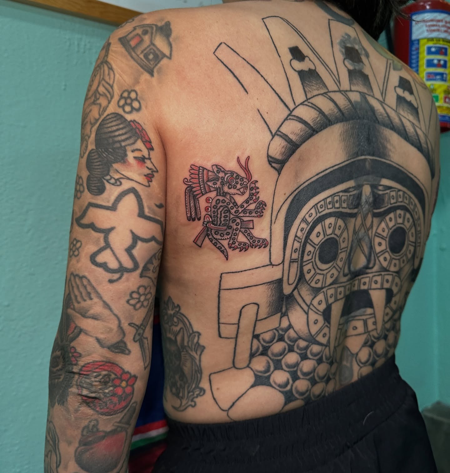 Ancient warrior American traditional tattoo on the back by Carmen Figueroa, New York, New York